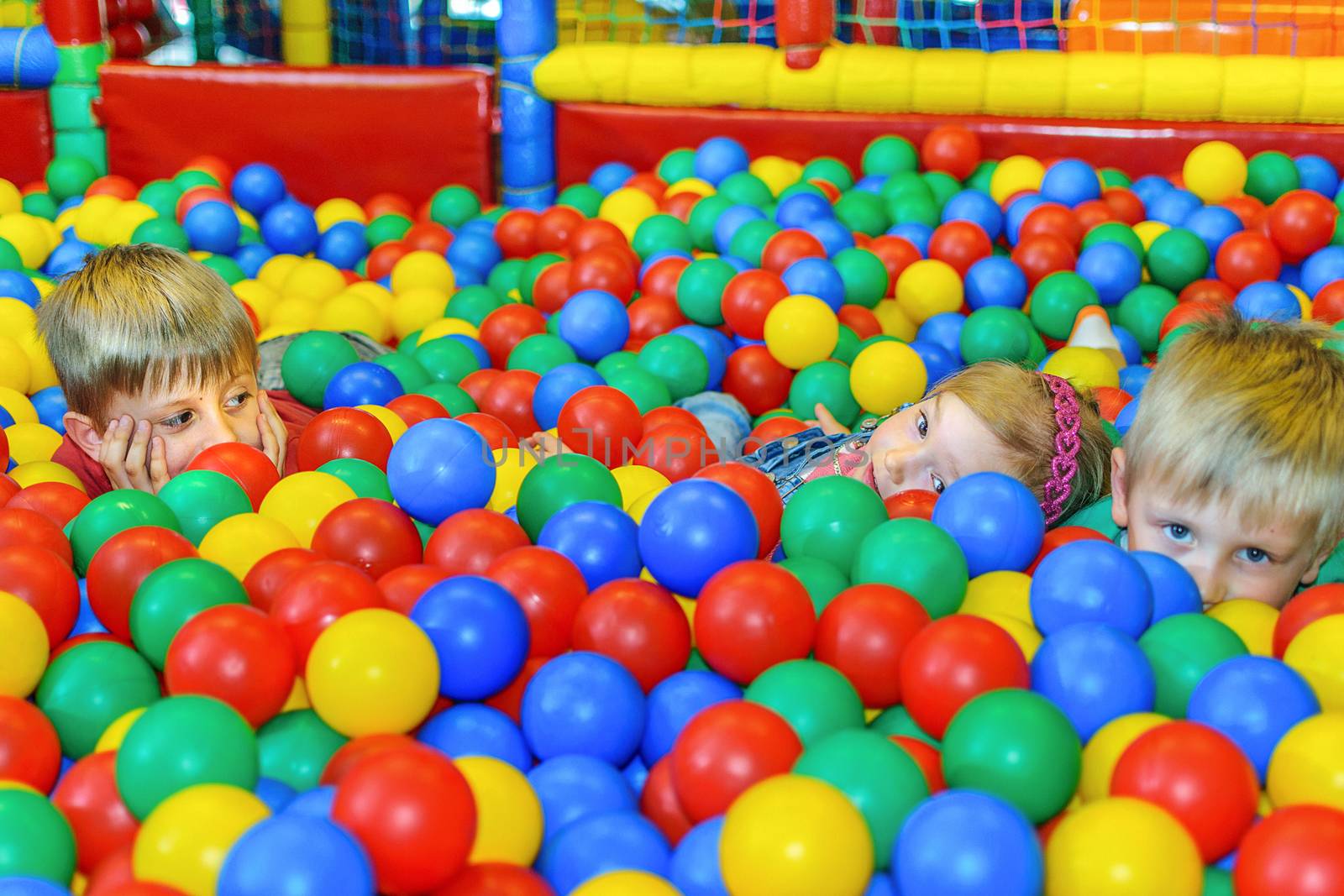  Cute kids in a sponge ball pool by wdnet_studio