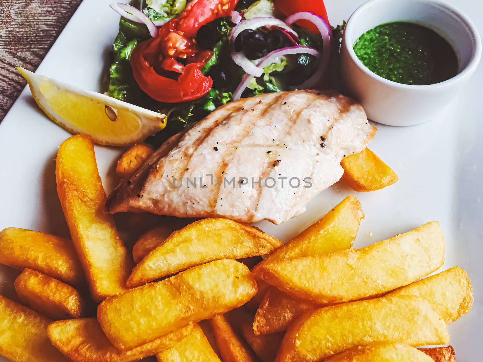 Grilled chicken, french fries and salad for lunch by Anneleven