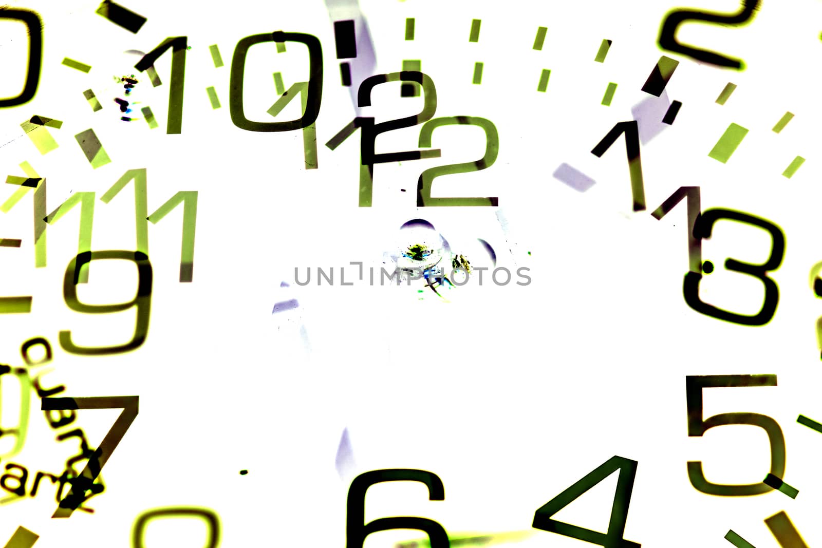 double exposure of a white clock showing numbers by paddythegolfer