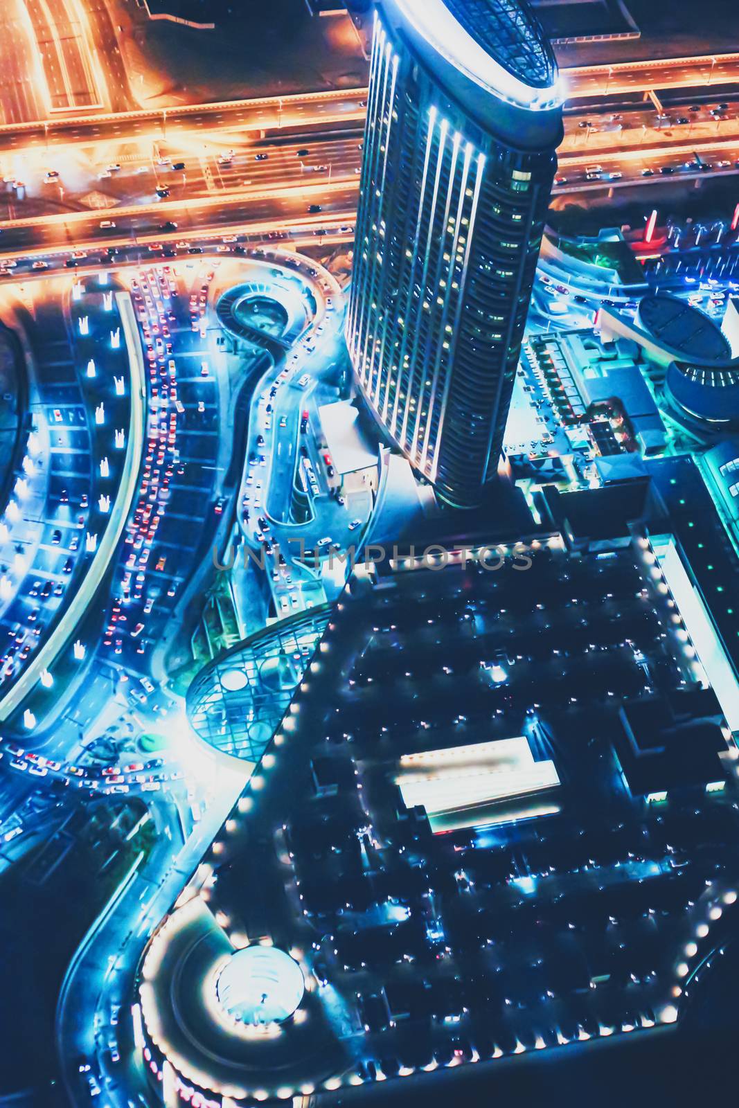 Aerial night view of Dubai in United Arab Emirates, metropolitan cityscape by Anneleven