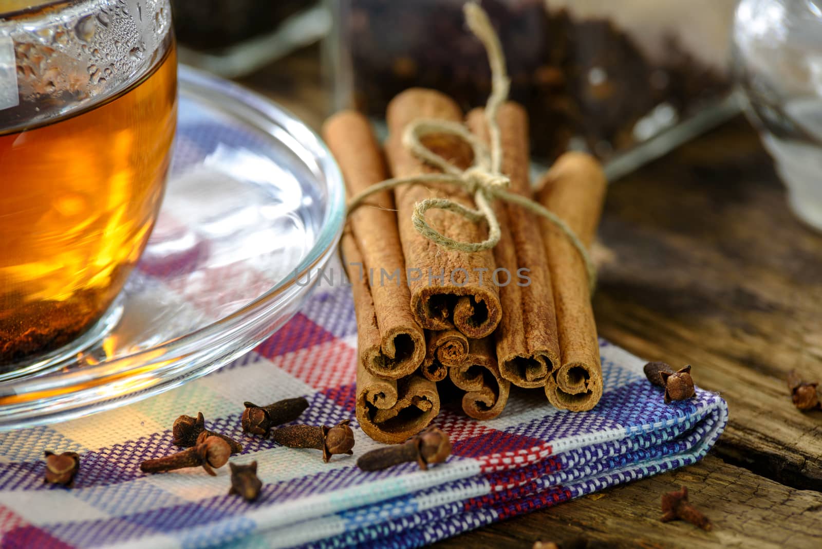 cinnamon sticks and aromatic tea by wdnet_studio