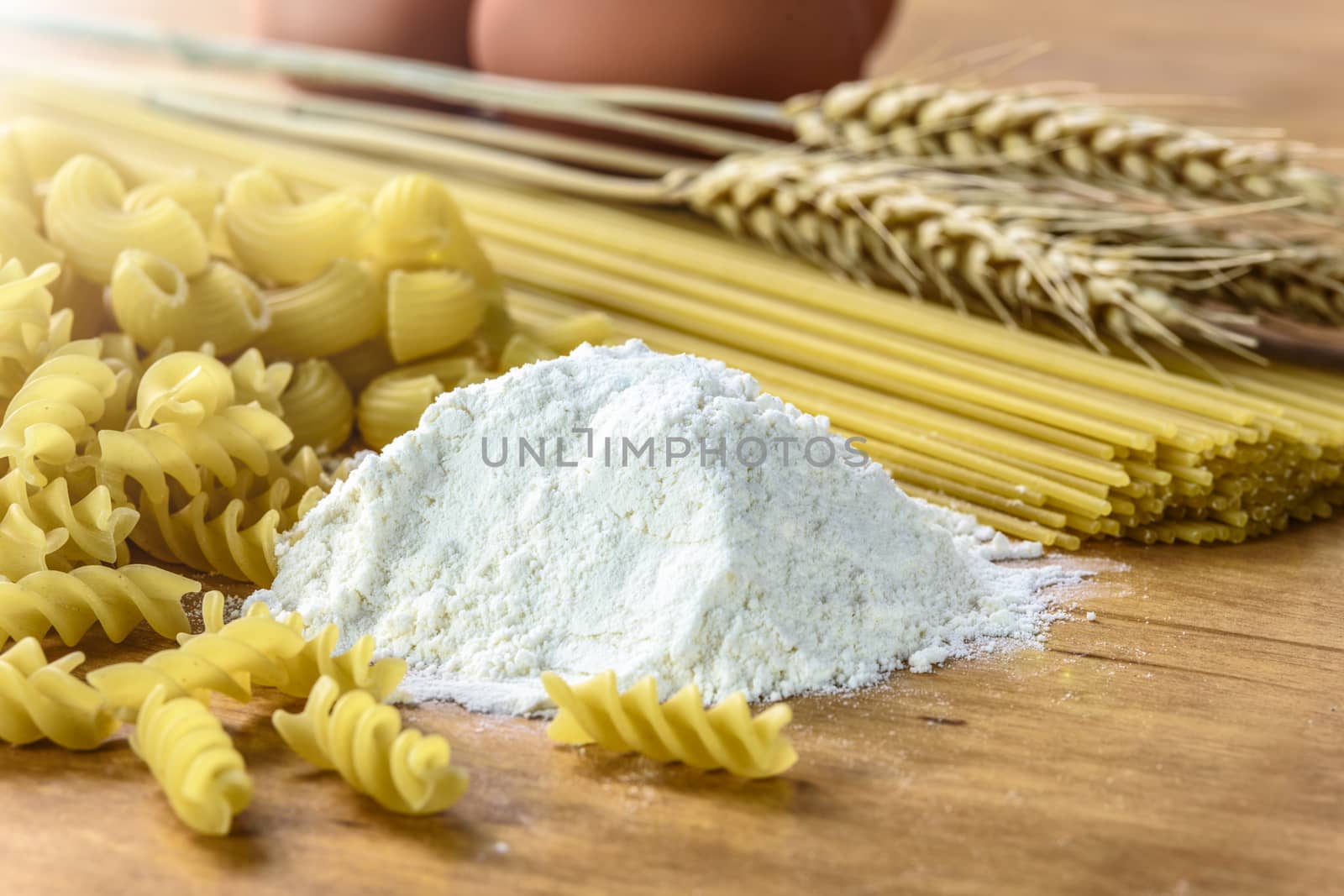 The concept of producing different types of pasta made from flour and eggs.