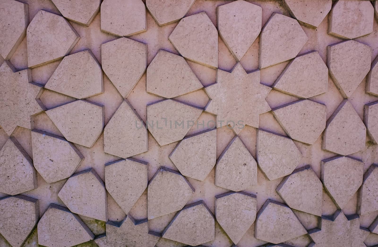 patterns etched into breakwater on Morecambe prom by paddythegolfer