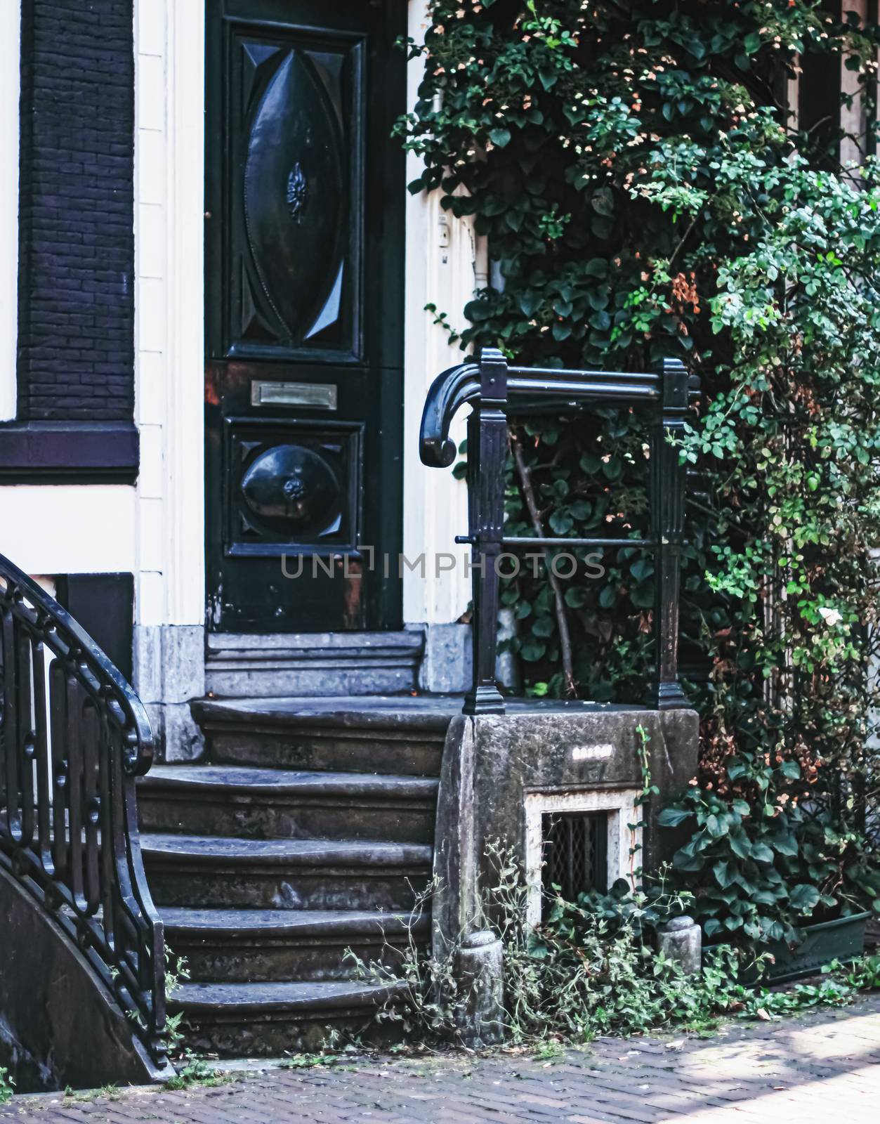 Architectural detail of a building on the main city center street of Amsterdam in Netherlands, european architecture