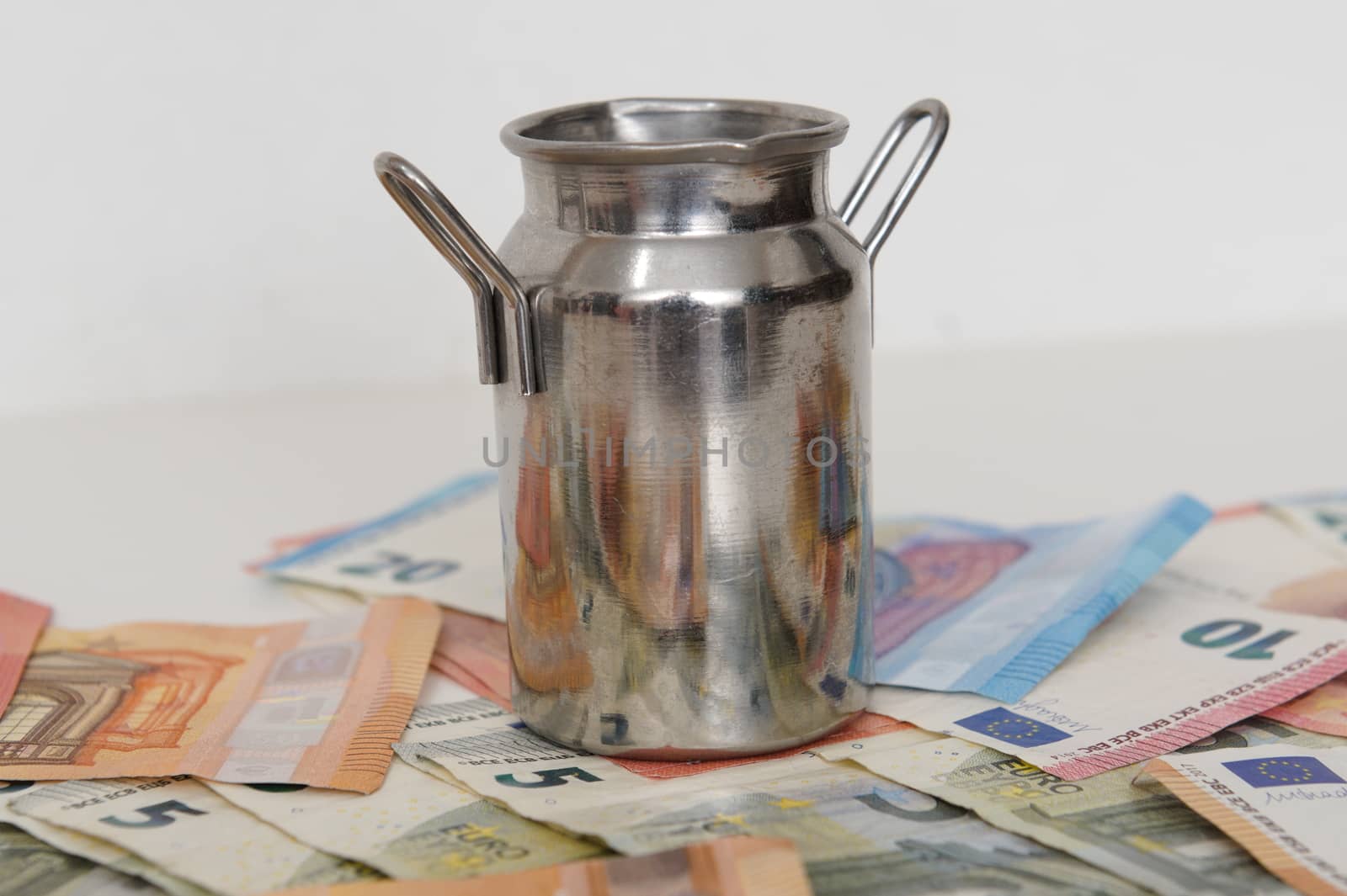 close up of euro money banknotes and milk churn by paddythegolfer