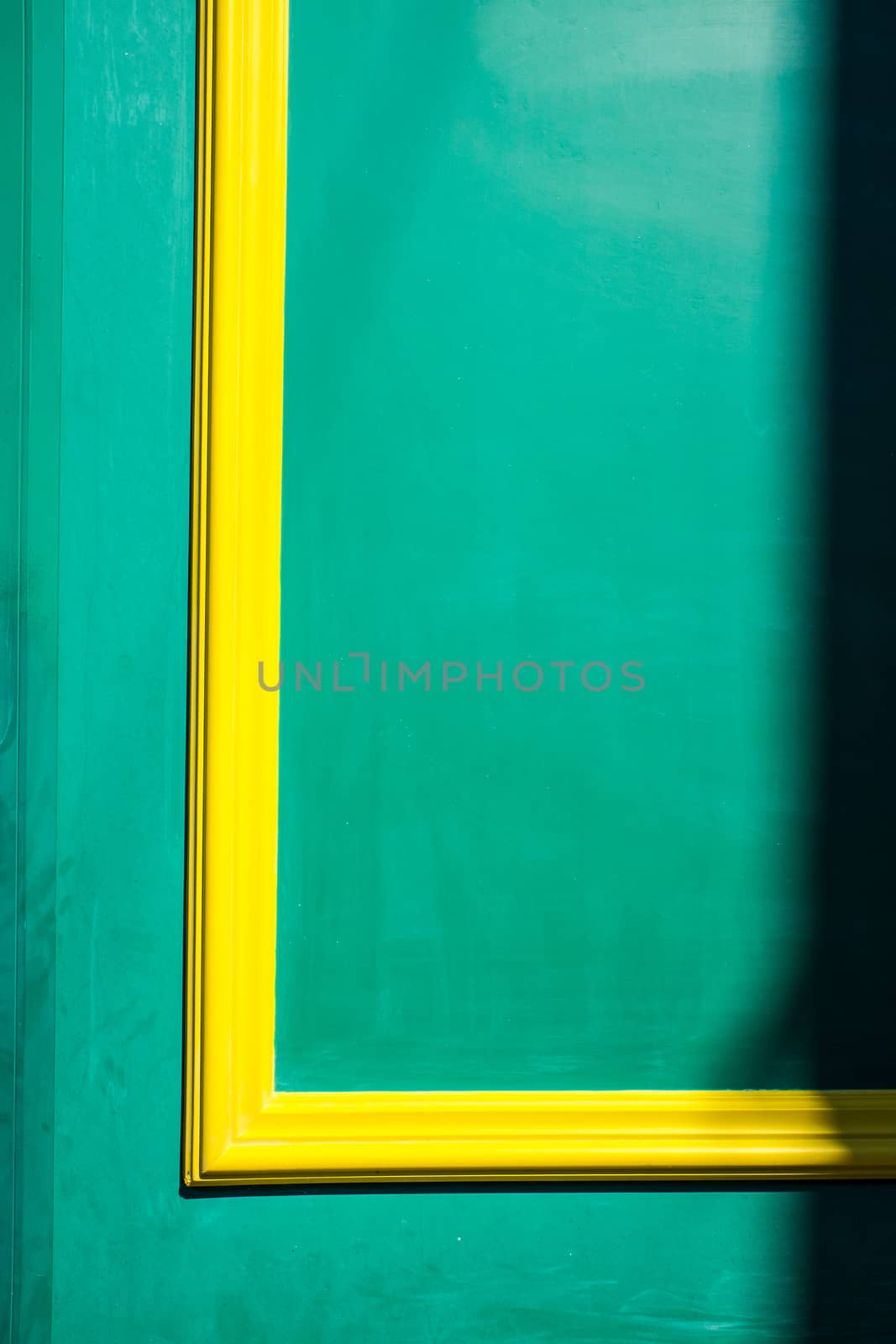 Abstract wood background in green with yellow stripe by paddythegolfer