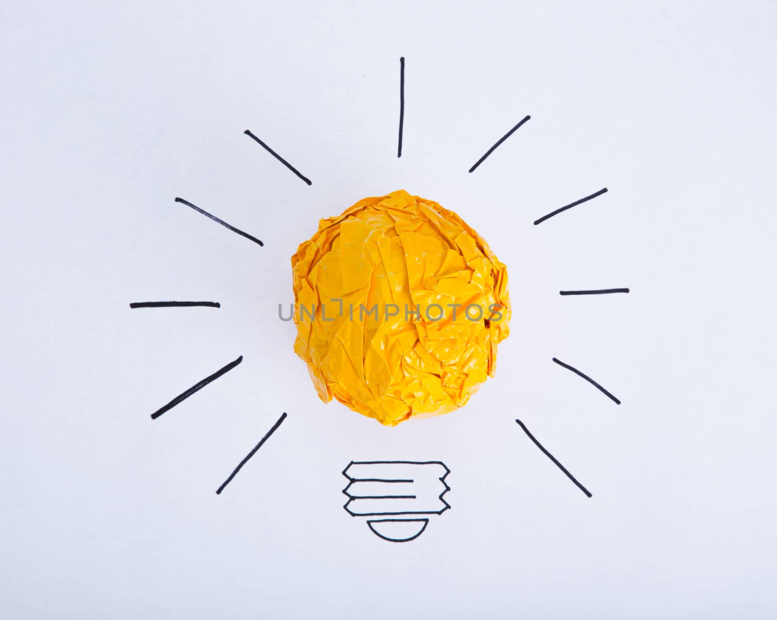 Inspiration concept crumpled color paper light bulb by tehcheesiong