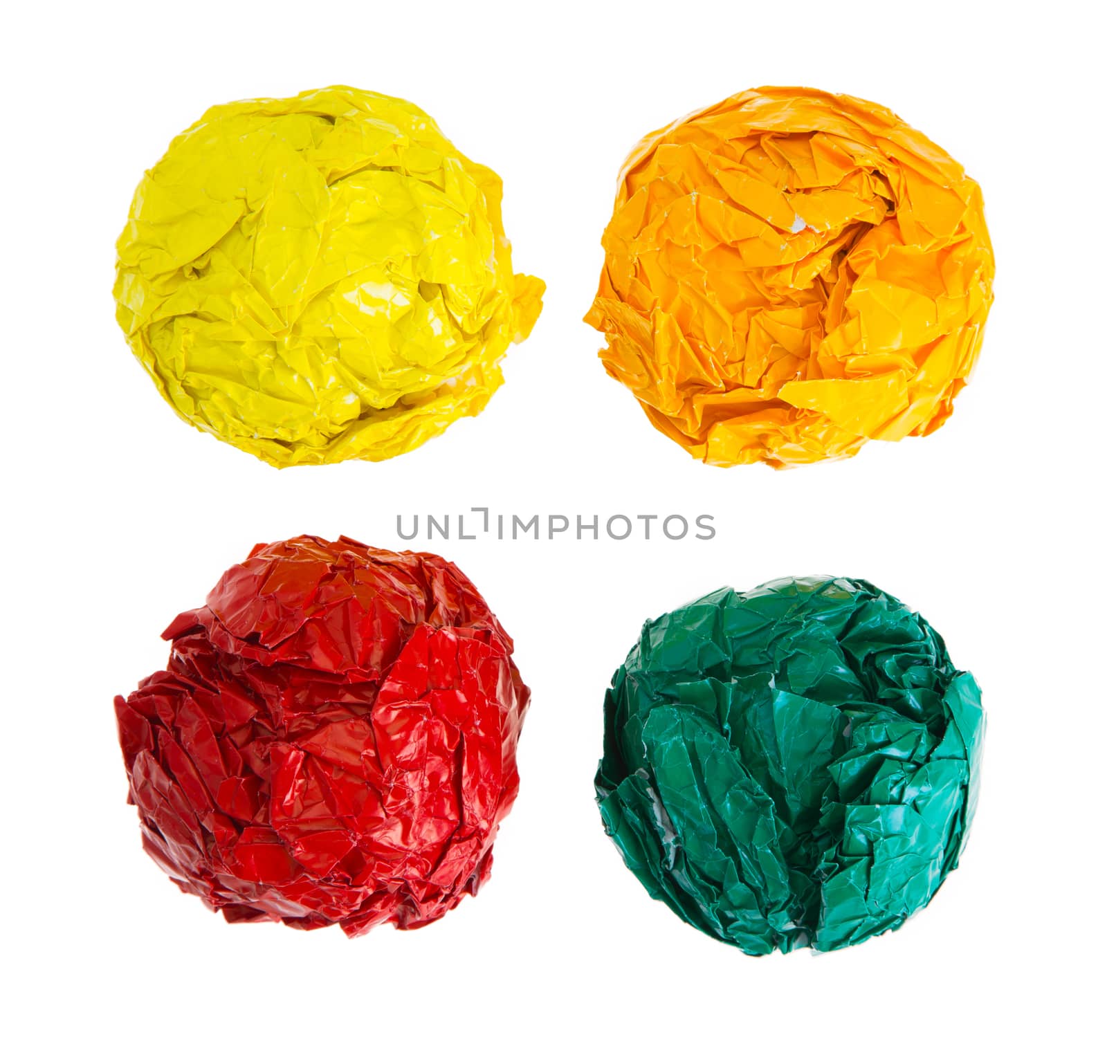 crumpled color paper ball isolated on white background