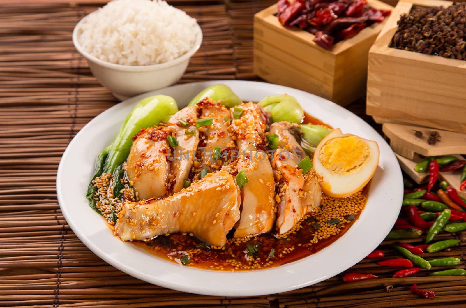 hot and spicy chicken serve with white rice