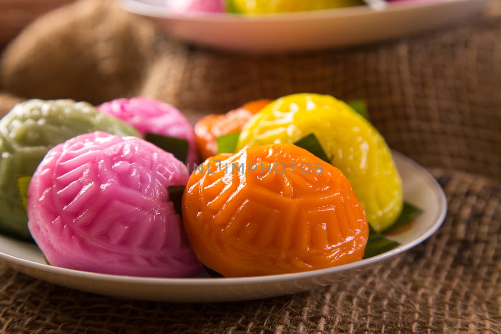 Ang ku kueh or chinese red tortoise cake is a traditional Asian dessert pudding made from glutinous rice flour with a salty or sweet filling