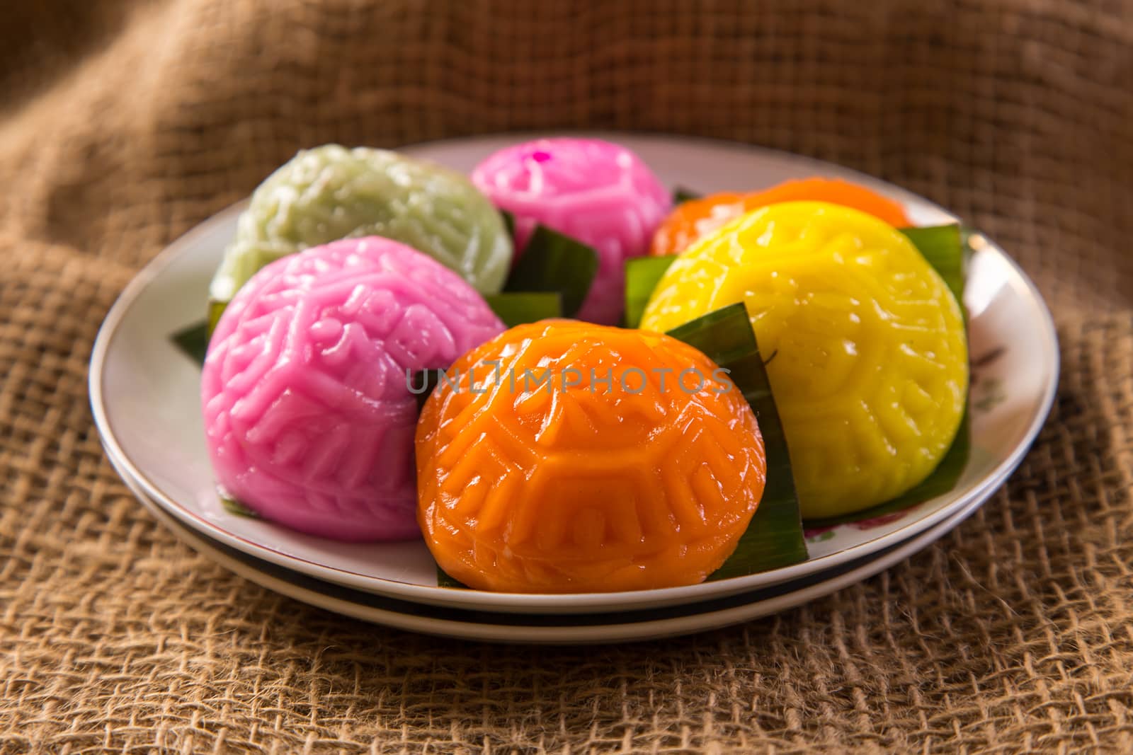 Ang ku kueh or chinese red tortoise cake is a traditional Asian dessert pudding made from glutinous rice flour with a salty or sweet filling