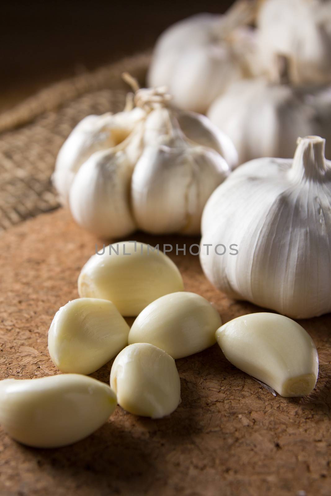 fresh garlic on wooden table