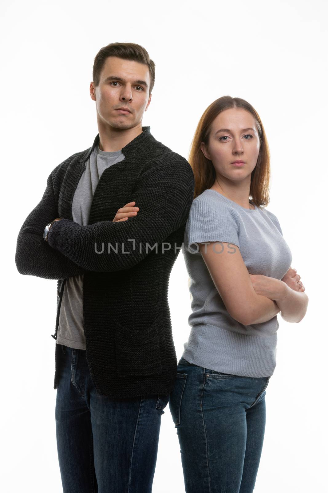 A upset couple looks into the frame