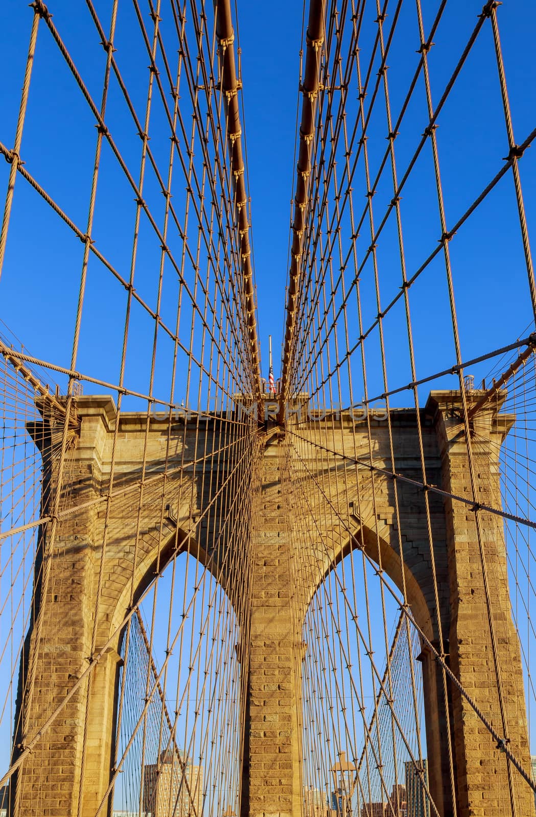 View of upward image of Brooklyn Bridge in New York from the East river