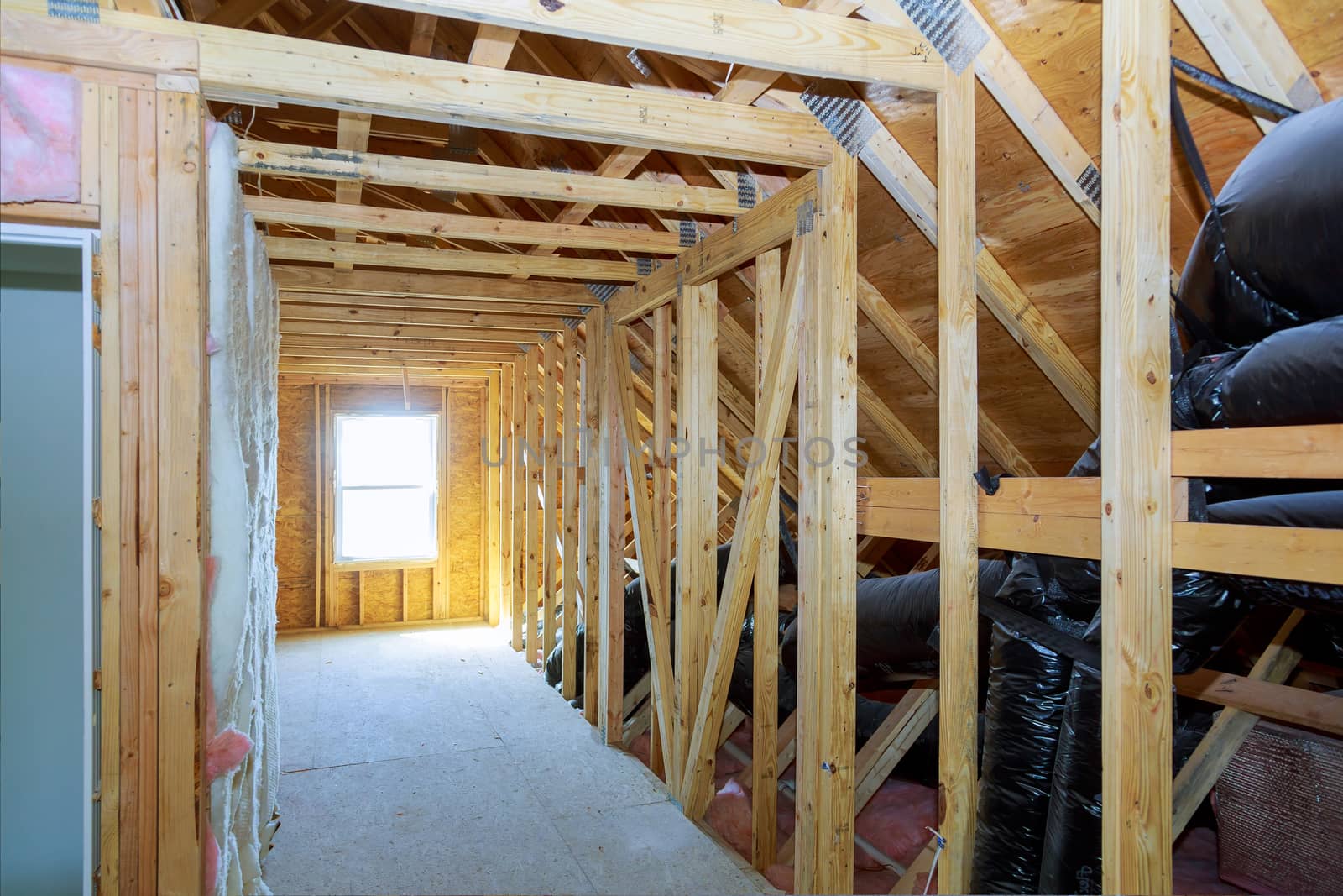 Thermal insulation in process of attic construction frame house a newly constructed home
