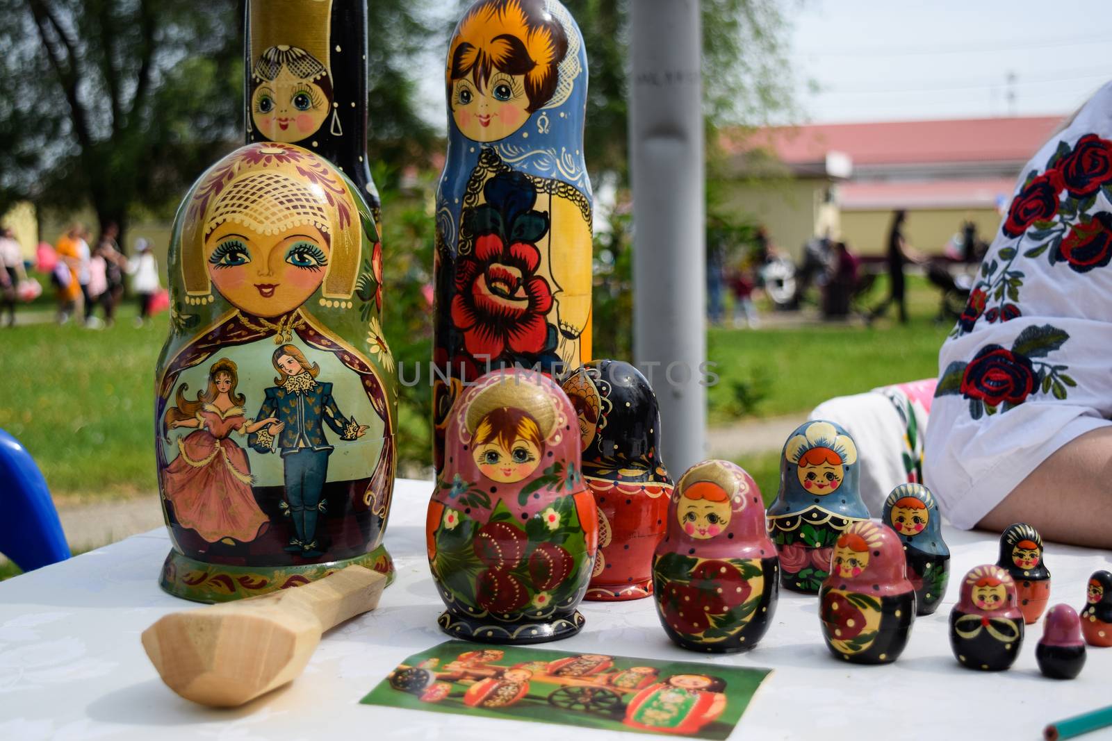 The matryoshkas are on the table. National Russian art painted matryoshkas.