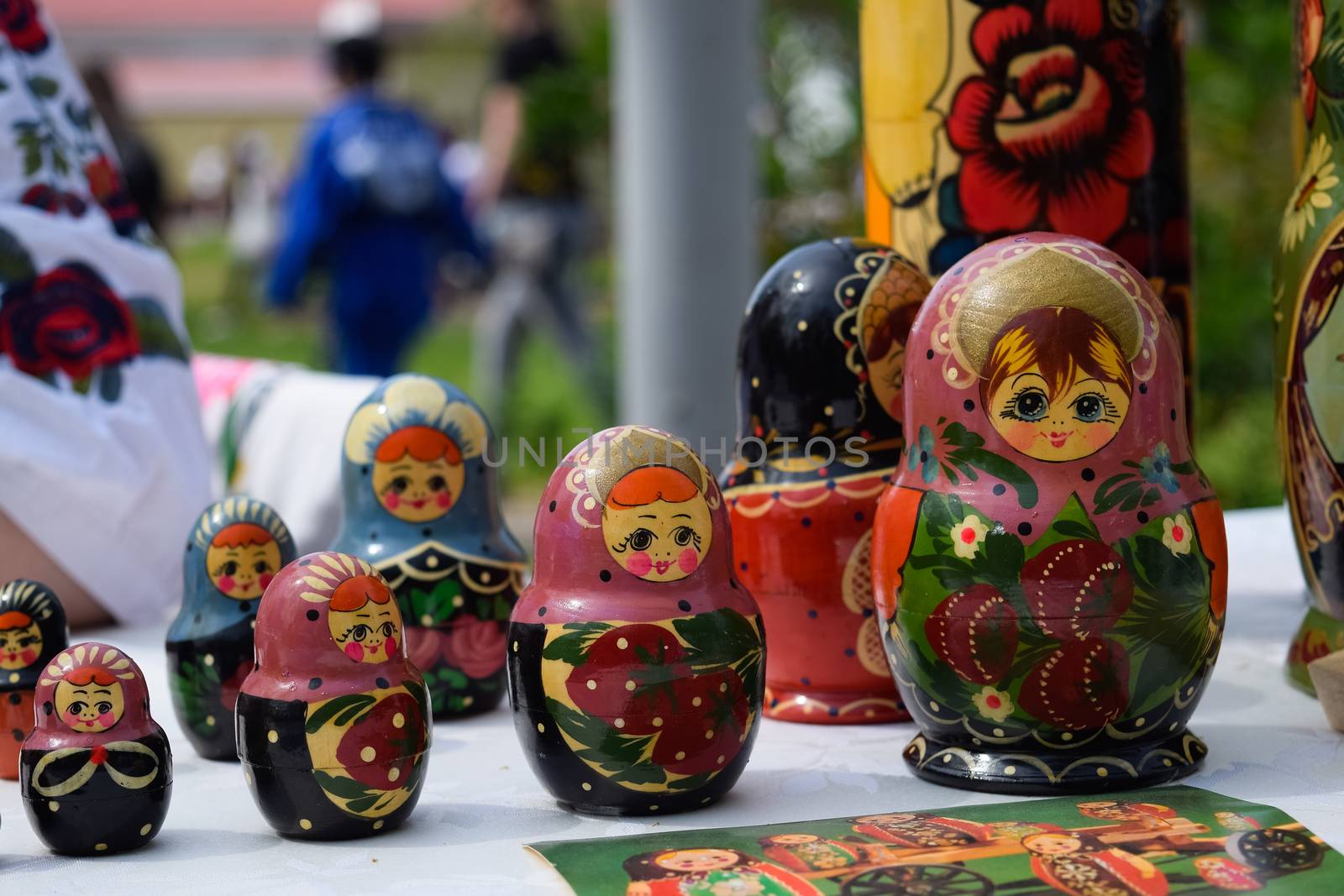 The matryoshkas are on the table. National Russian art painted matryoshkas.