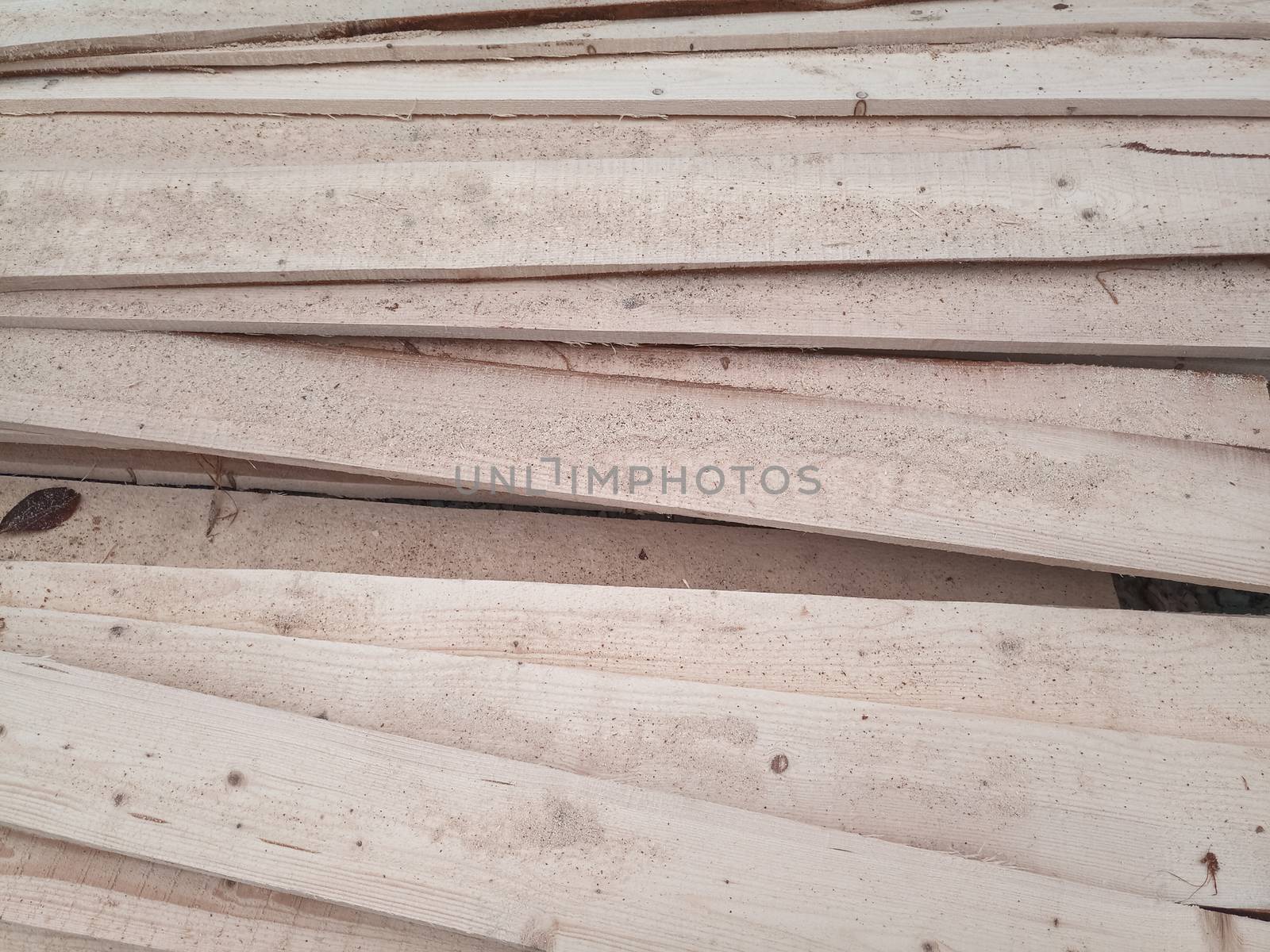Boards with a sawmill. Building material from wood, boards for construction.