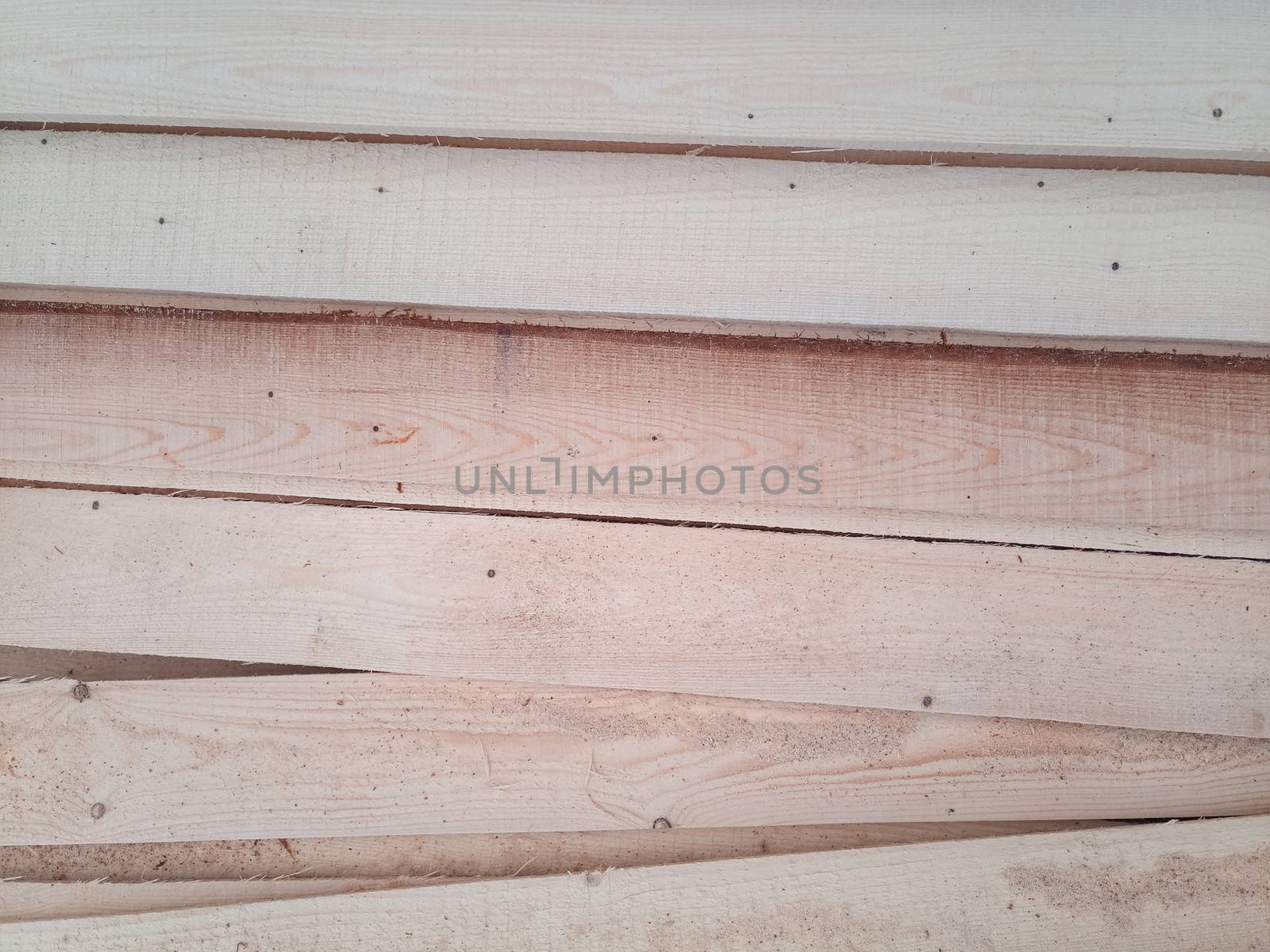 Boards with a sawmill. Building material from wood, boards for construction.