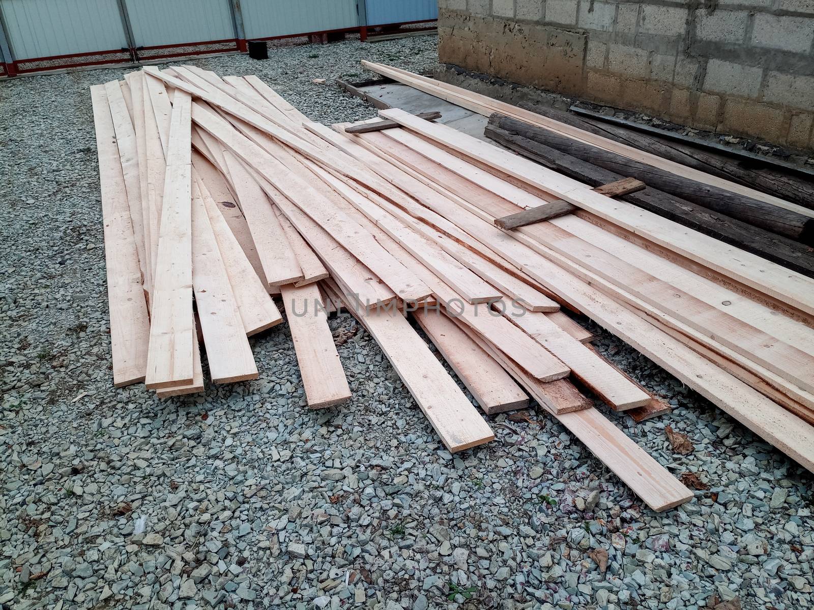 Boards with a sawmill. Building material from wood, boards for construction.