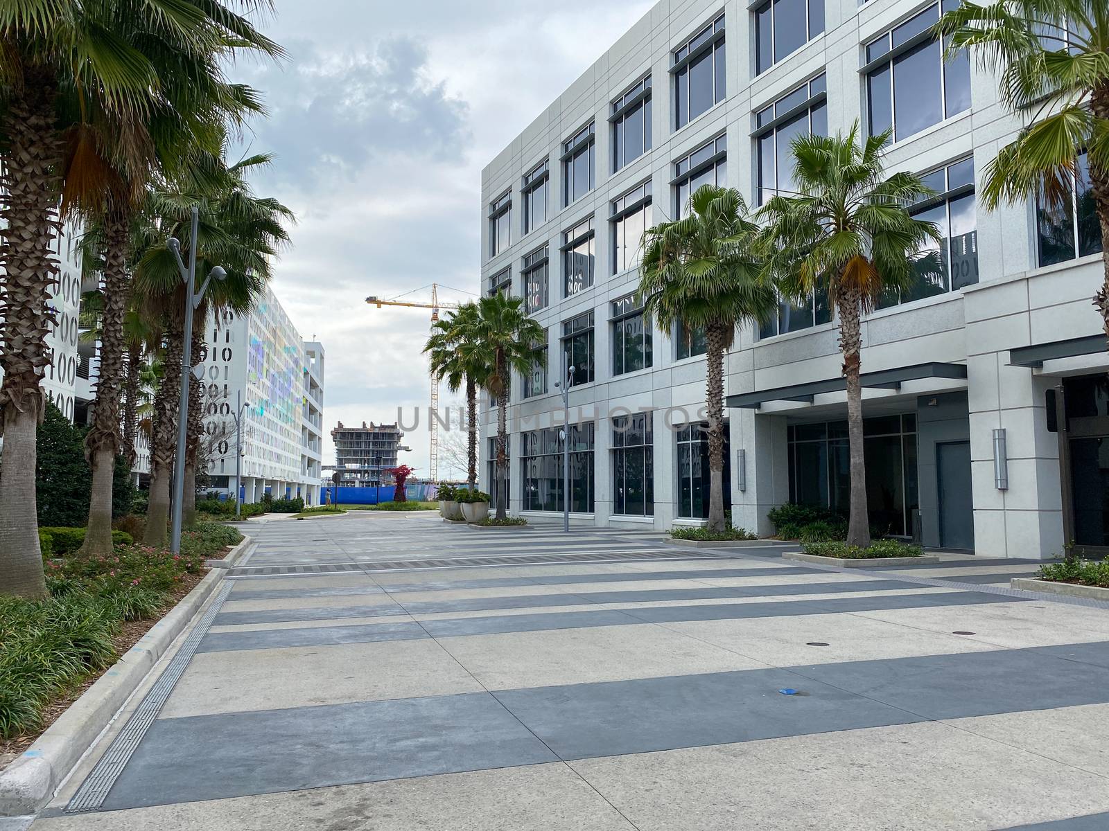 Orlando, FL/USA-4/10/20:  The exterior of the Binary Parking Garage and an office building in Town Center at Laureate Park at Lake Nona in Orlando, Florida.