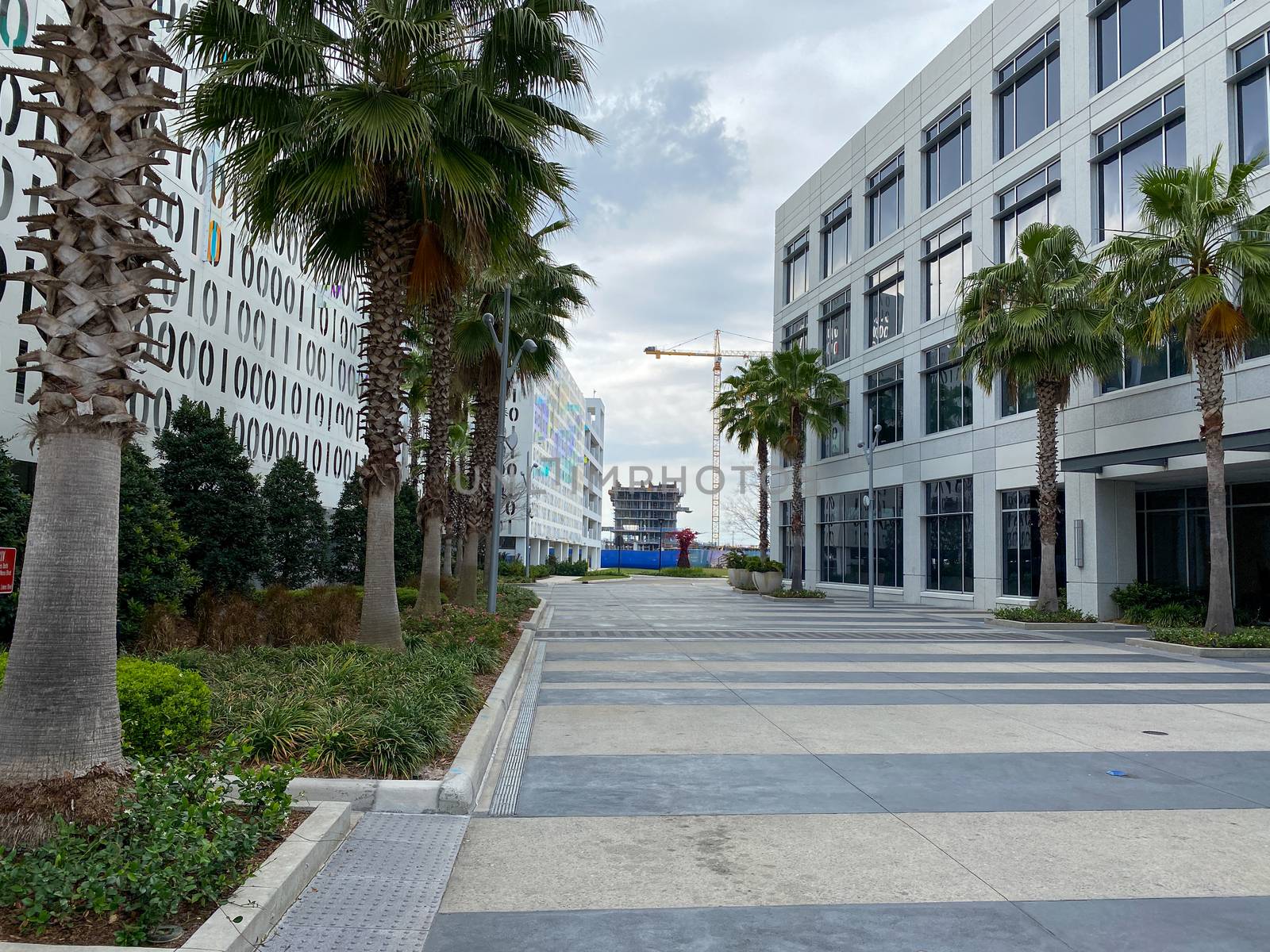 Orlando, FL/USA-4/10/20:  The exterior of the Binary Parking Garage and an office building in Town Center at Laureate Park at Lake Nona in Orlando, Florida.