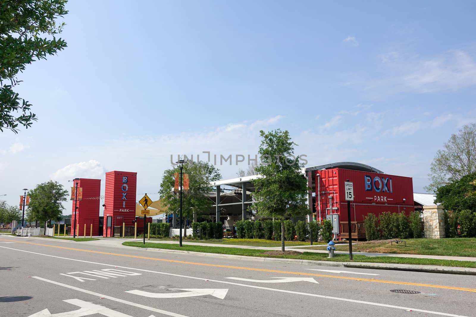 Orlando, FL/USA-4/10/20:  The exterior of Boxi Park a group of repurposed shipping containers that are grouped together to make up an outdoor restaurant, bar and entertainment venue in Lake Nona in Orlando, Florida.