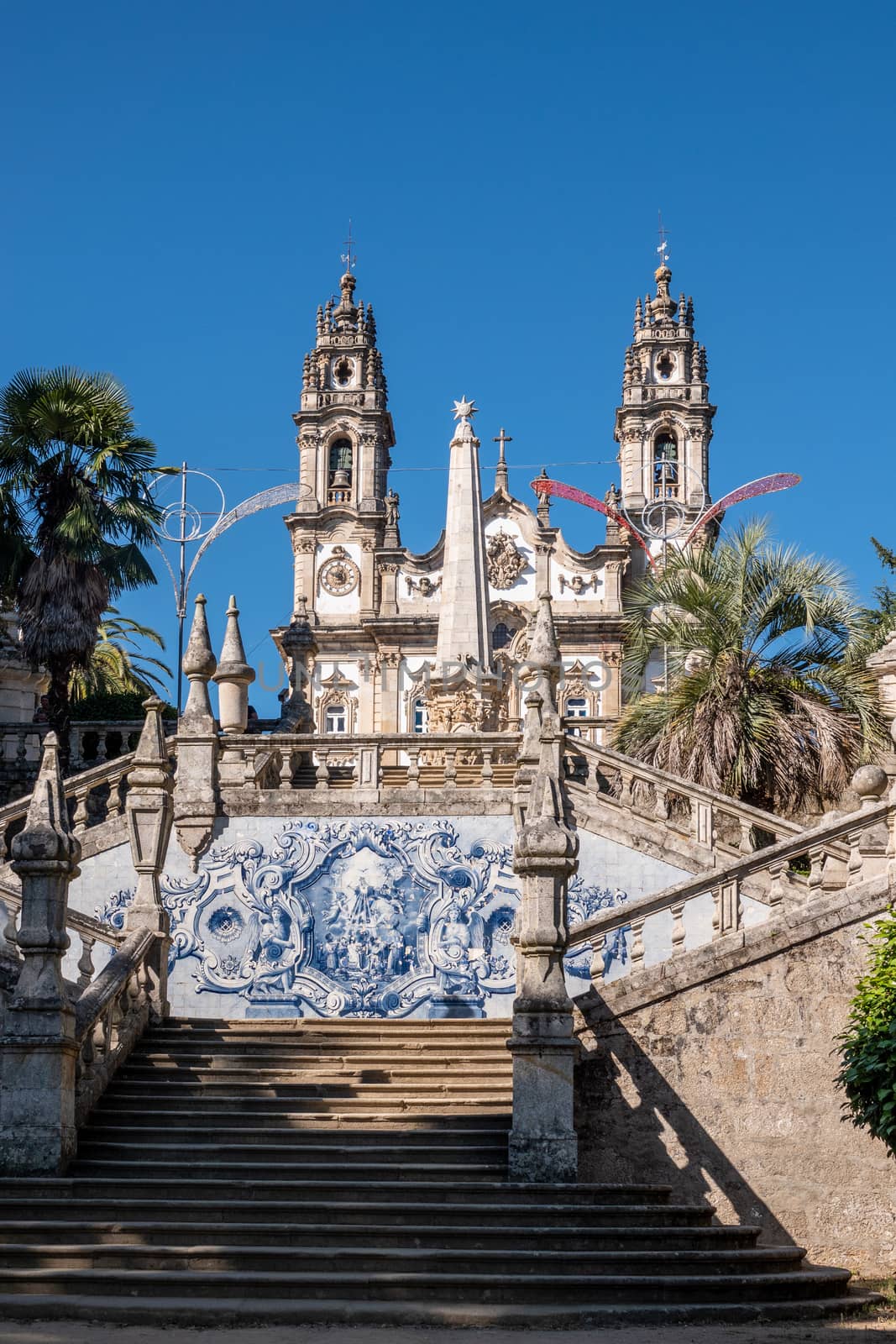 Multiple sets of stairs to Our Lady of Remedies church above the city of Lamego by steheap
