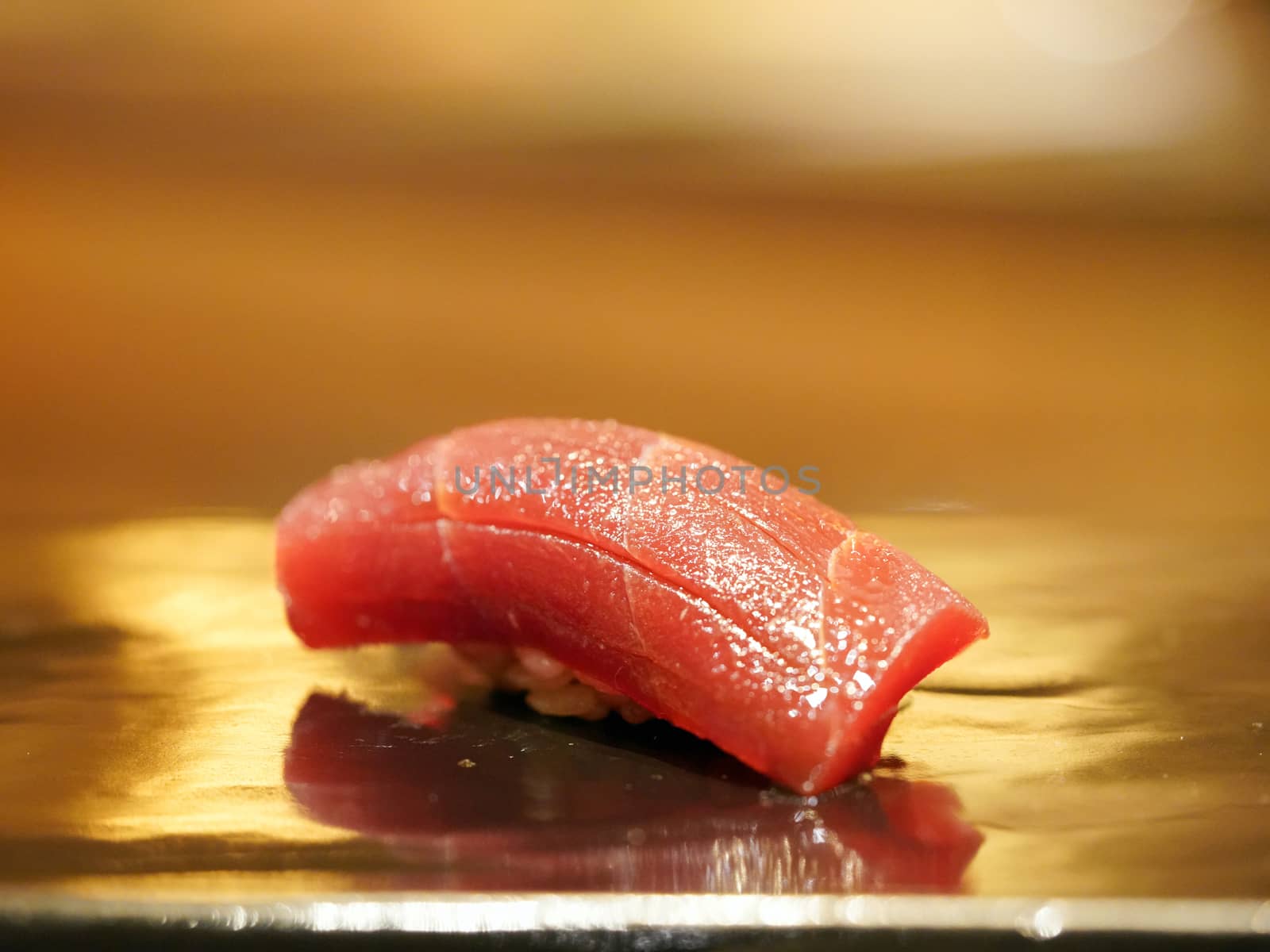 Tuna Sushi Served on black wooden plate. Japanese Omakase course.