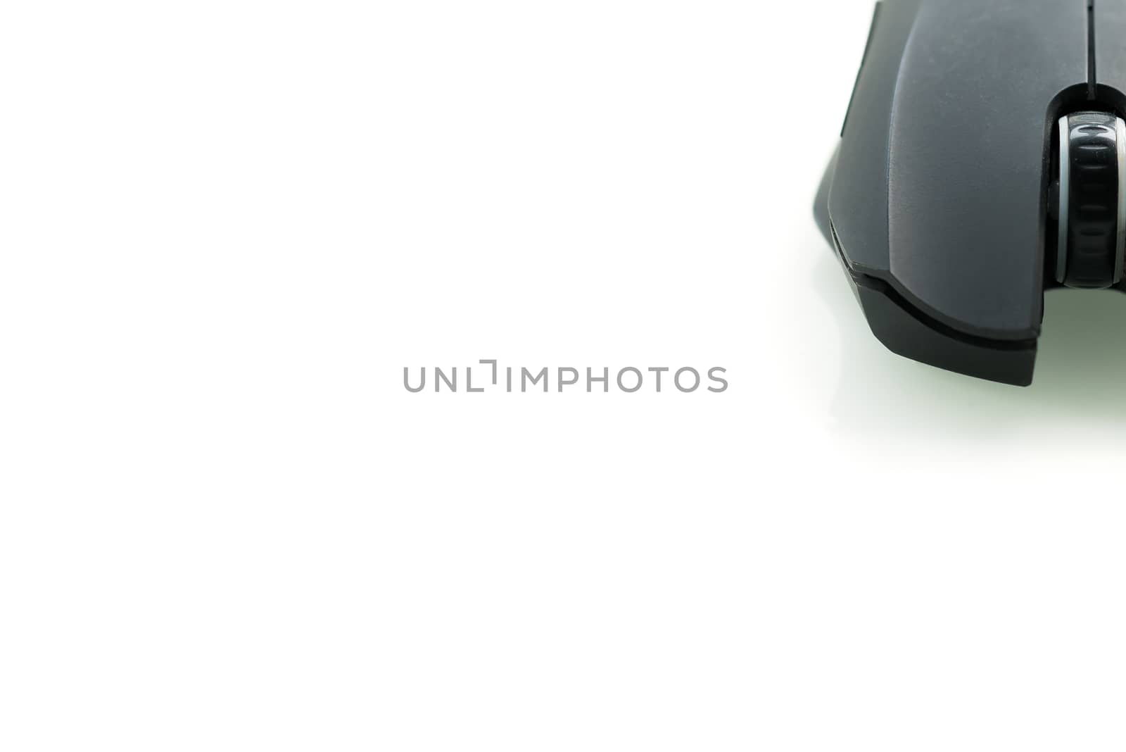 Wireless black computer mouse isolated on white background, clos by psodaz