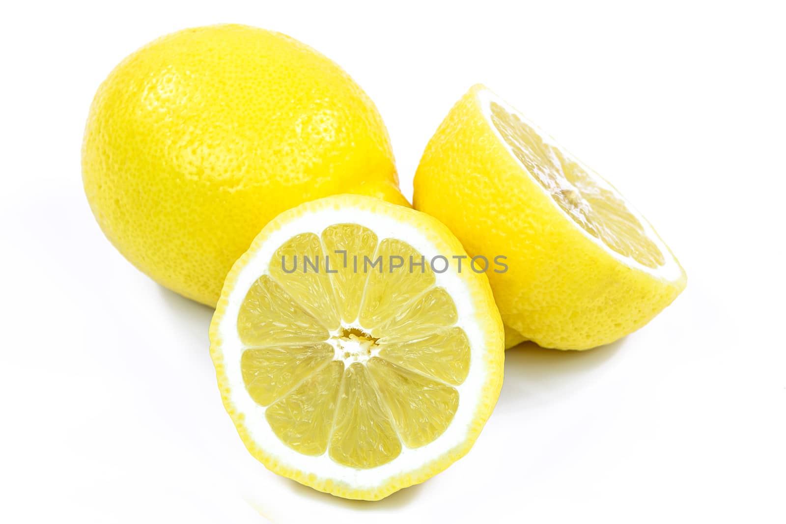 Two fresh lemons isolated on white background.