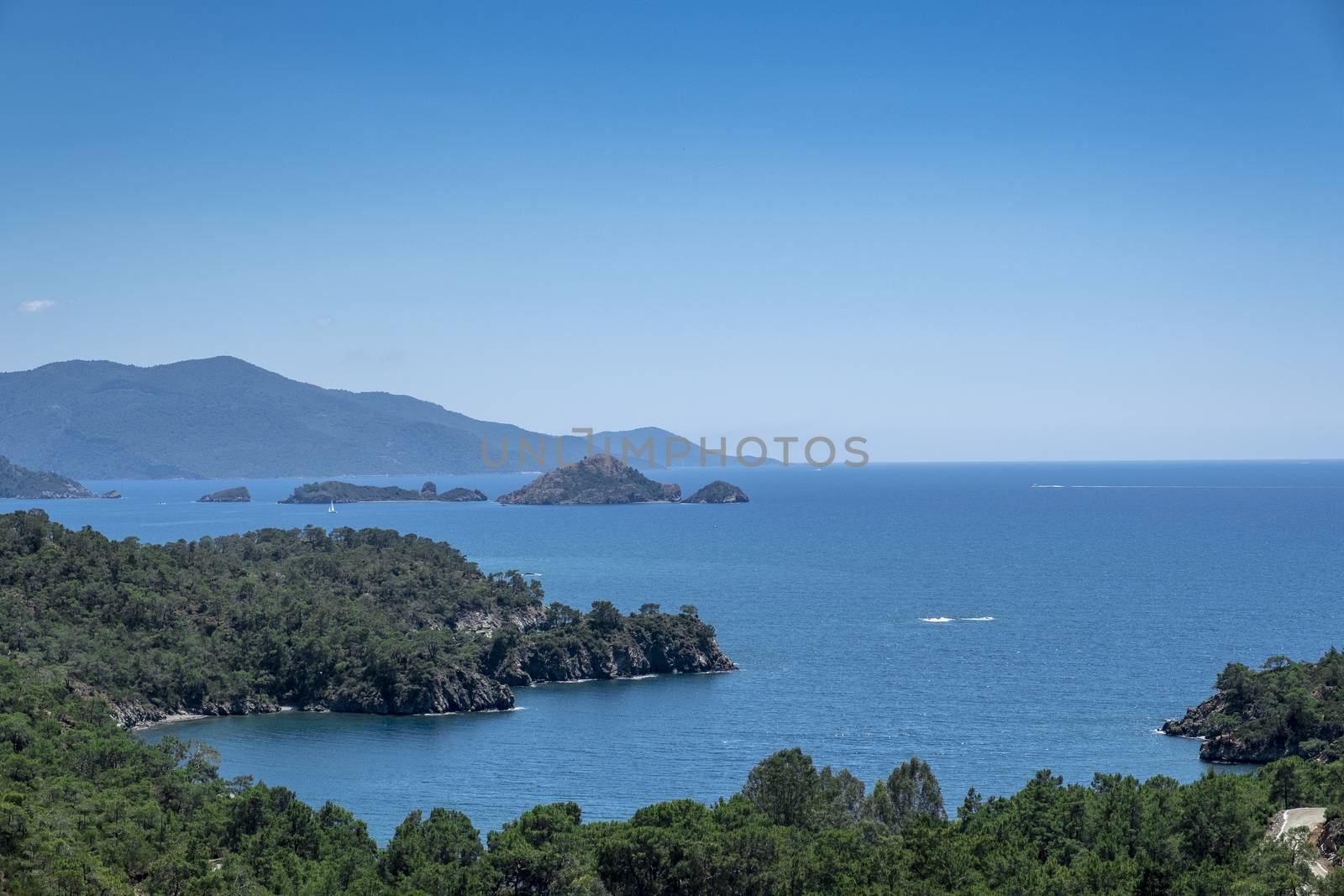 Meditation and fun in nature. Forest and beautiful sea in Mediterranean. by oaltindag