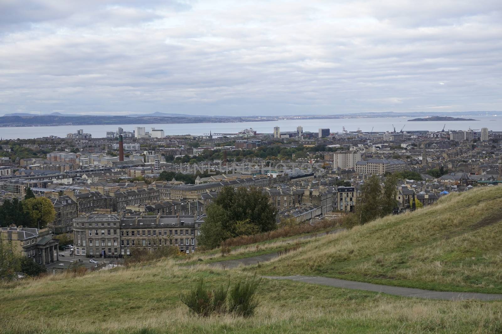 View over Edinburgh to the sea by pisces2386