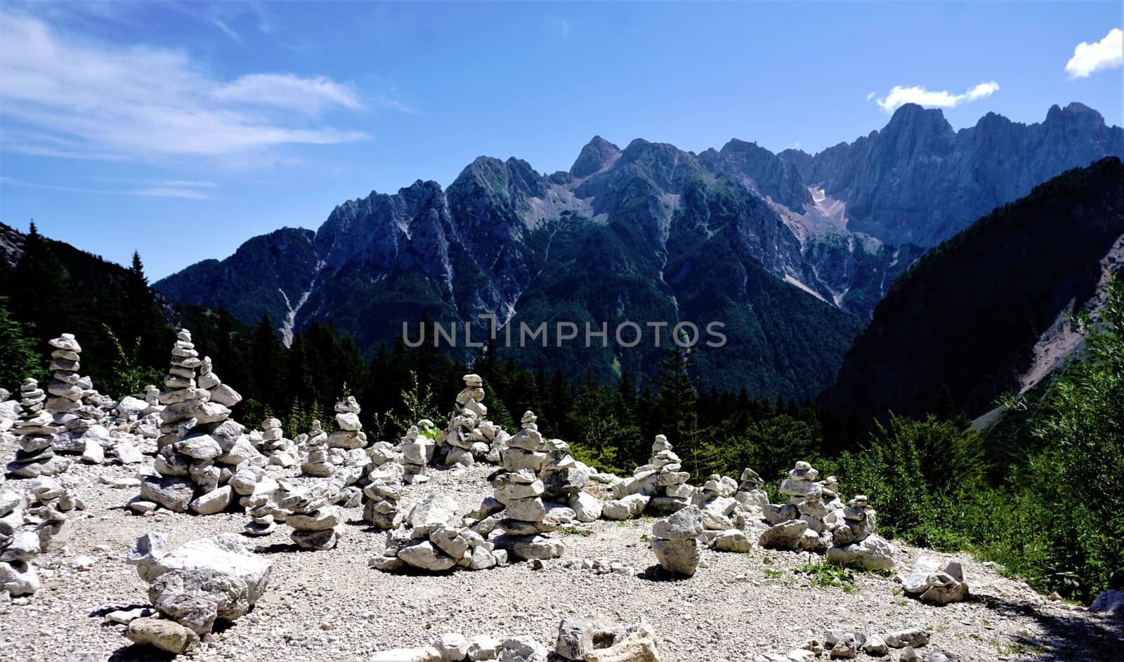 Vrsic pass with stone piles and Triglav mountains, Slovenia