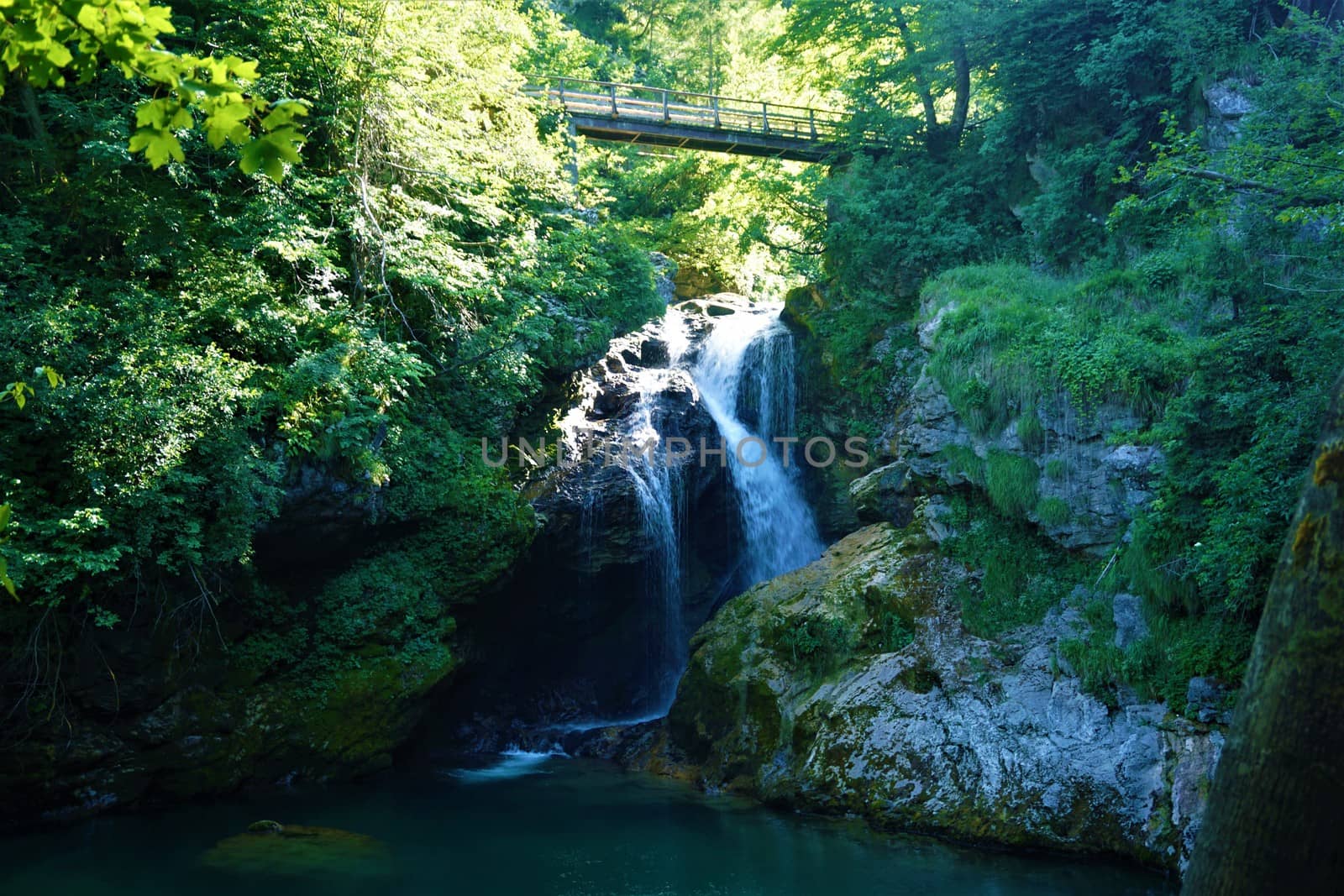 Sum waterfall at the end of Vintgar Gorge in Blejska Dobrava, Slovenia