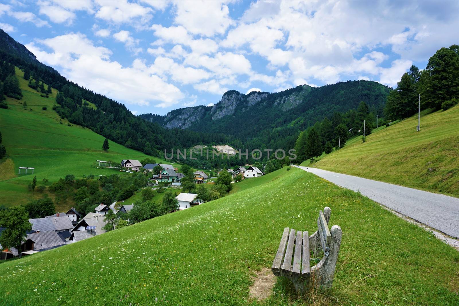 Bench on the road to Zgornja Sorica in Upper Carnolia by pisces2386