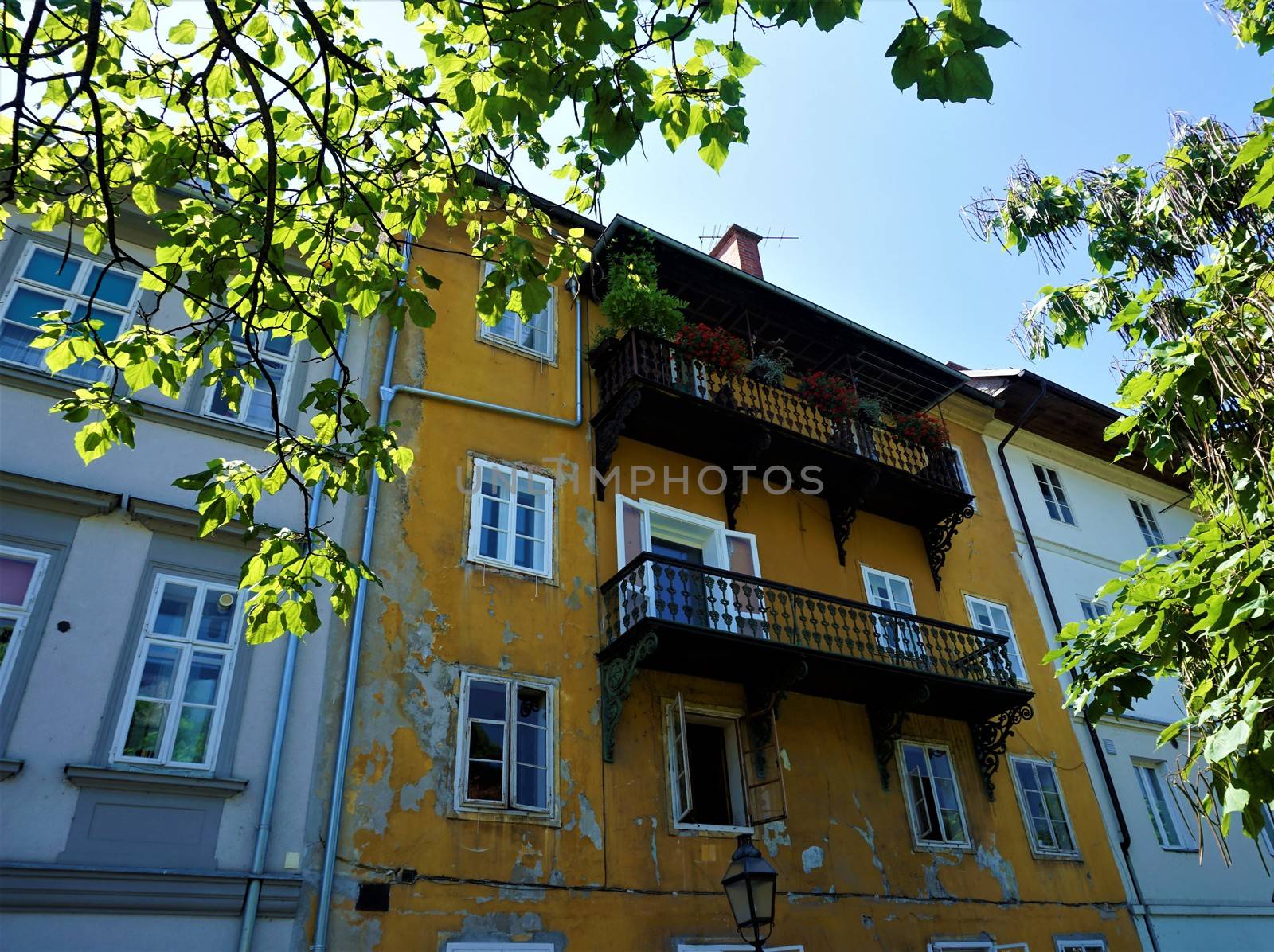 Beautiful yellow residential home in Hribarjevo nabrezje Ljubljana, Slovenia