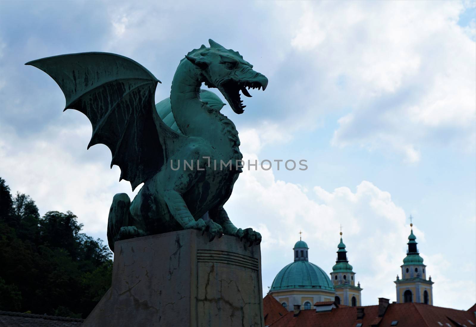 Dragon from the dragon bridge and Saint Nicholas cathedaral Ljubljana, Slovenia