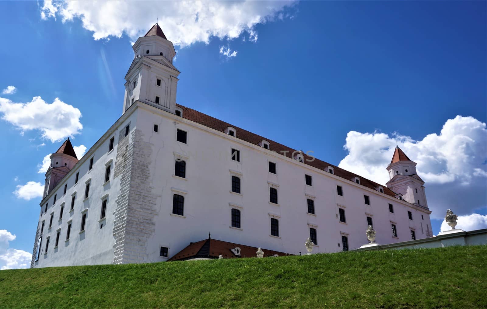 Bratislava castle, meadow and blue sky in summer