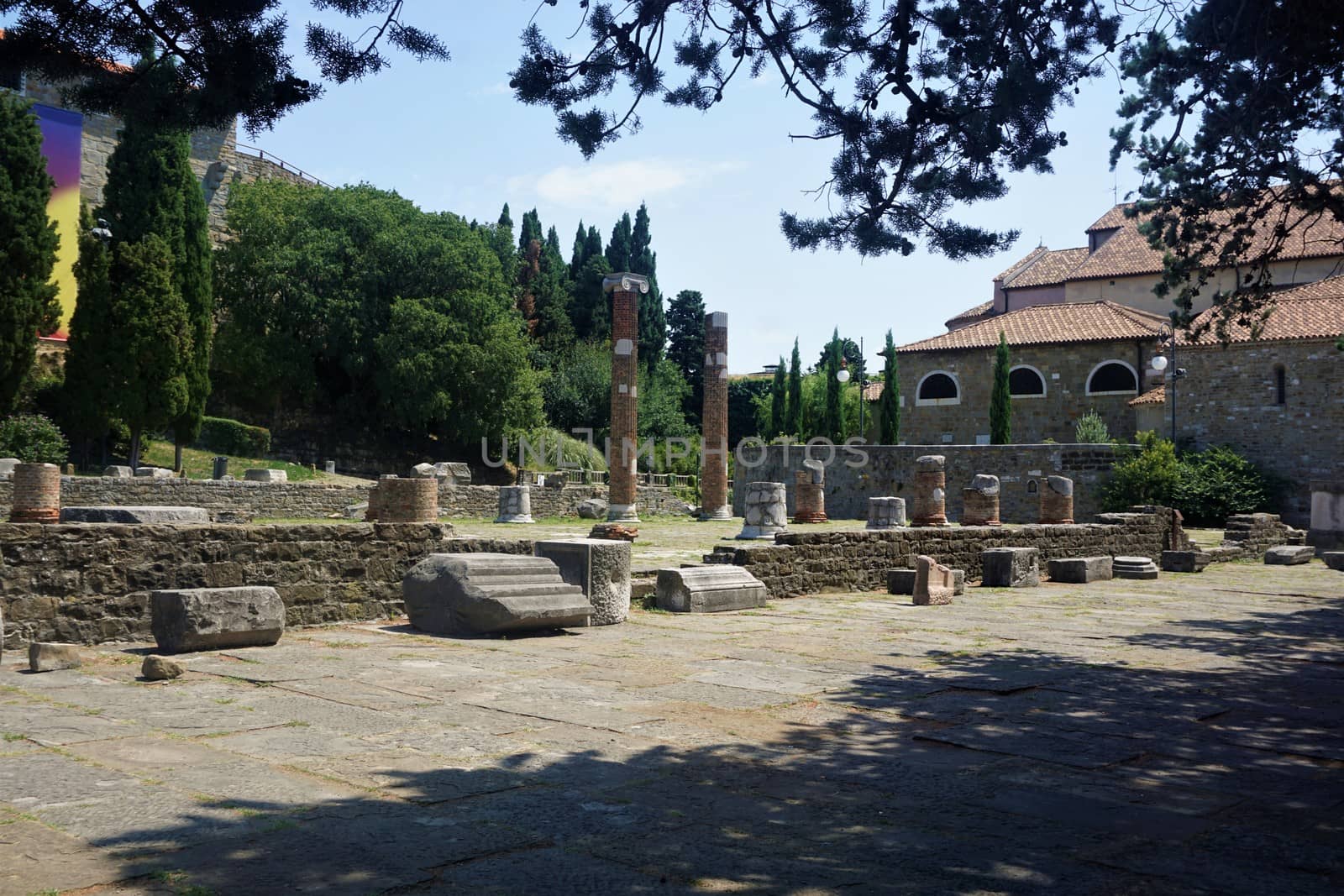 Roman stone piles and part of the cathedral of Trieste, Italy