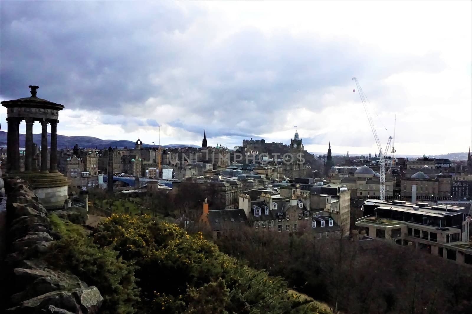 Beautiful view over Edinburgh, Scotland from Calton Hill with Dugald Stewart Monument