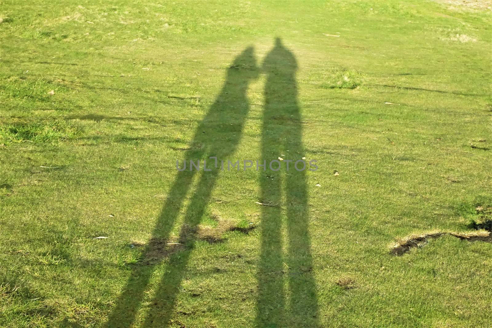 Shadow of two friends on Calton Hill Edinburgh by pisces2386