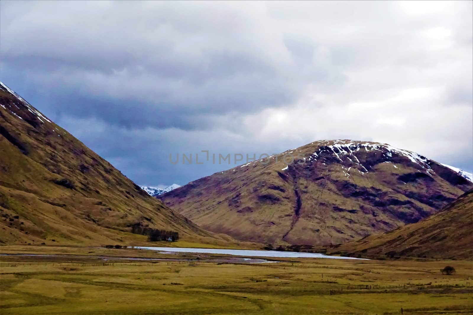 Beautiful Loch Achtriochtan, Glencoe Scotland on cloudy day