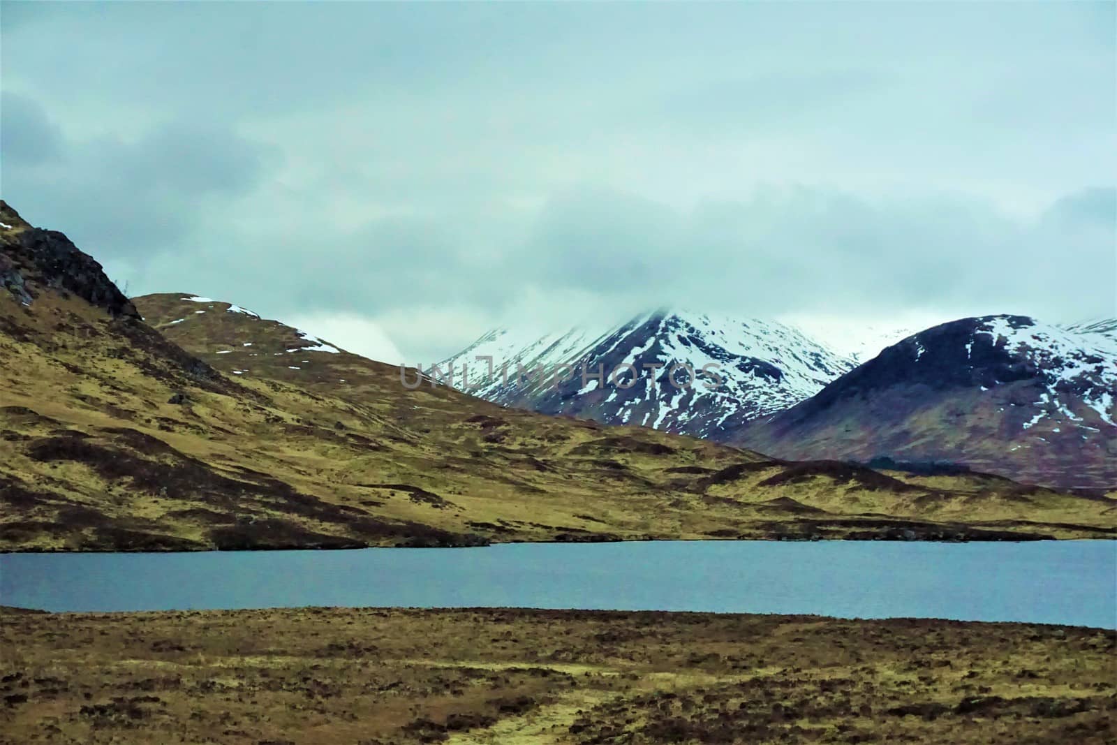 Mountains with smooth as a mirror Lochan na h-Achlaise, Bridge of Orchy by pisces2386