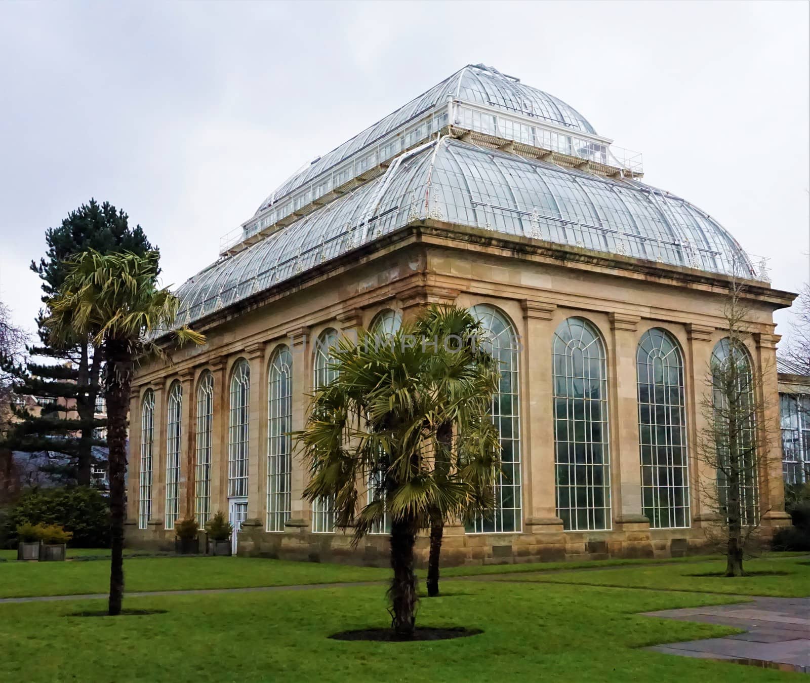 Facade of one of the glass houses in the Royal Botanical Garden of Edinburgh by pisces2386