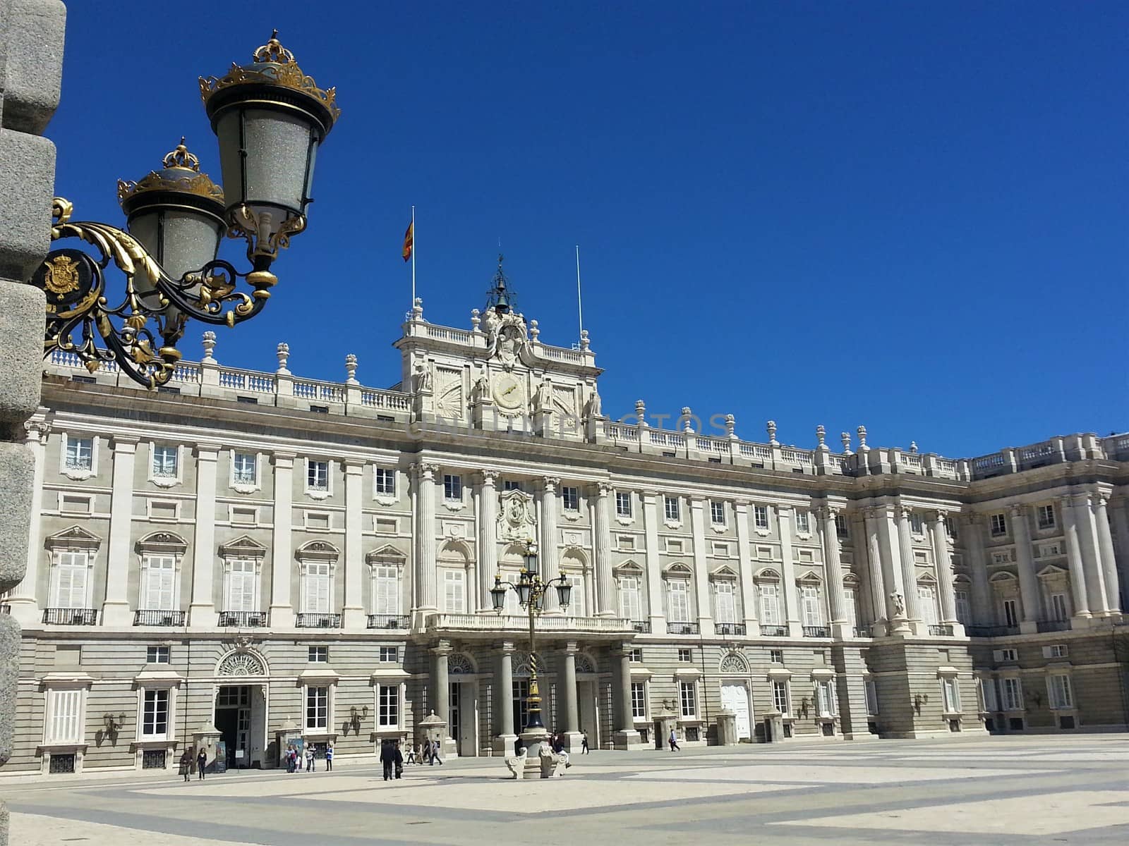 The Royal palace in Madrid, Spain with golden lamps