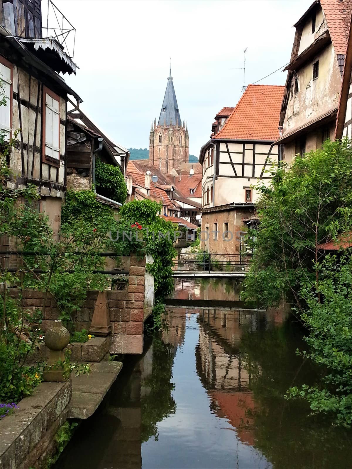 Beautiful view over tranquil canal in the city of Wissembourg, France