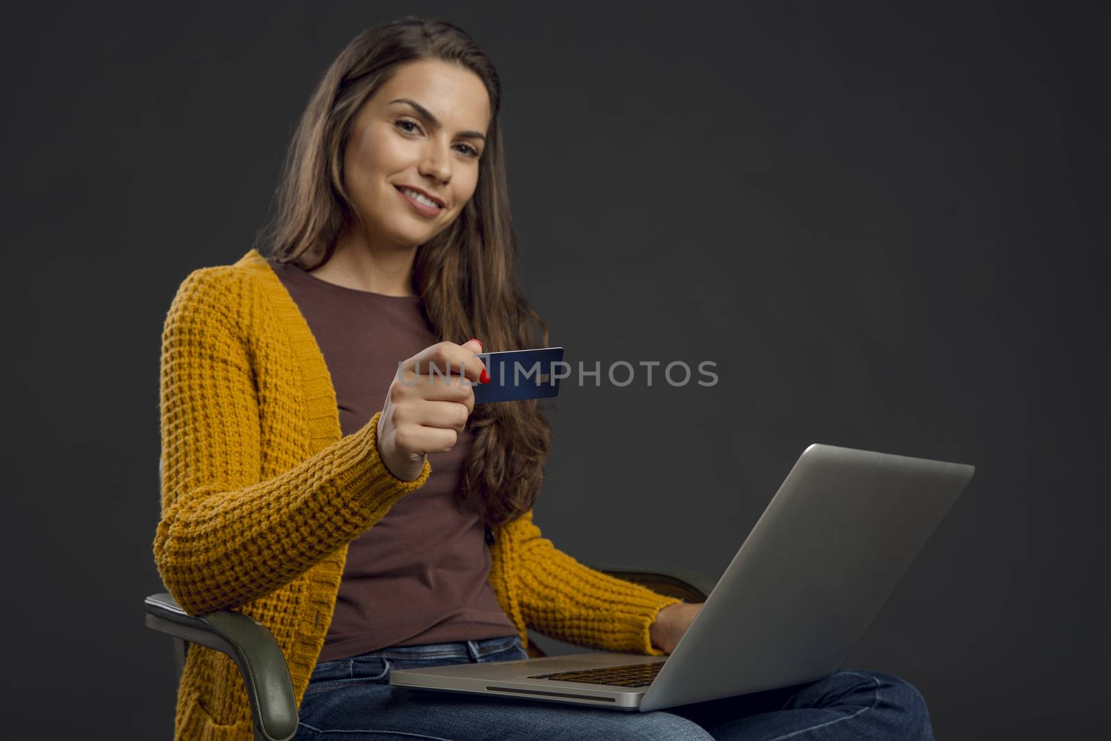 Beautiful woman doing some online shopping