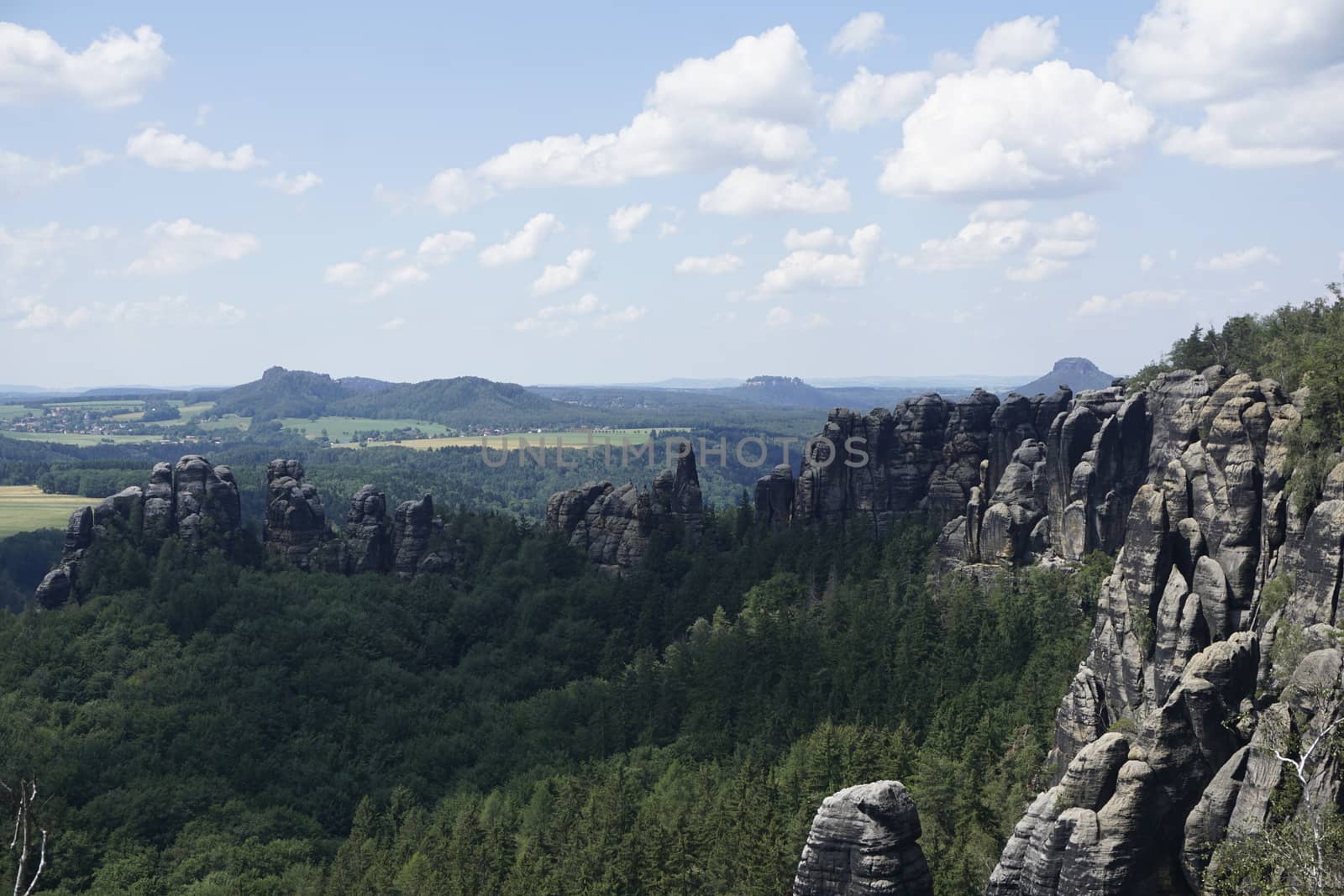 View over the Schrammsteine ridge and different famous mountain peaks of Saxon Switzerland
