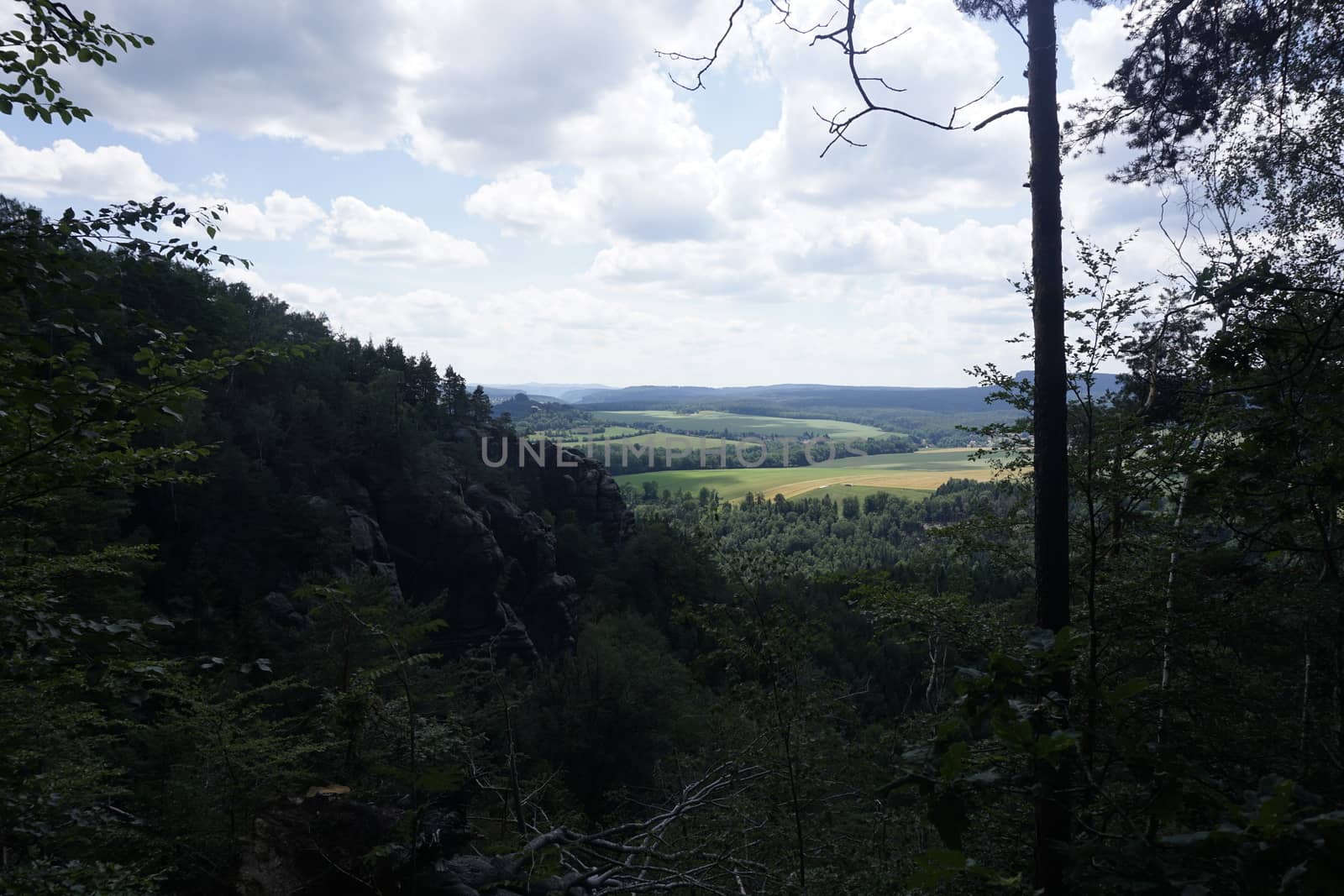 Panorama over landscape with fields in Saxon Switzerland, Germany